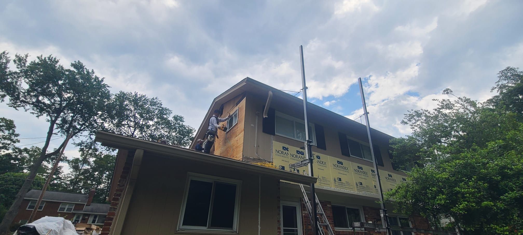 Fairfax: Residential Siding Replacement with CertainTeed 8" Board and Batten Siding in Desert Tan by RM Banning, Inc.