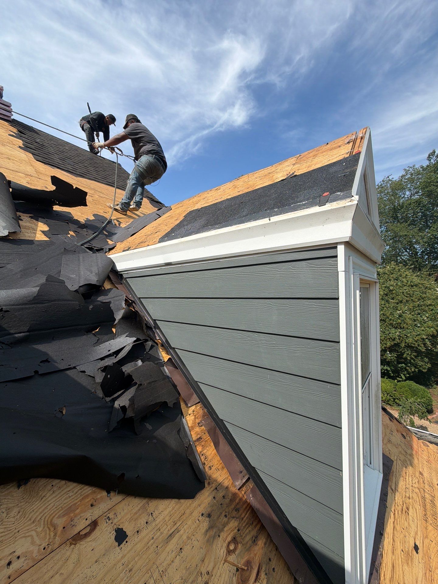 Roof Replacement and White Gutter Installation in Gloucester by Cade Construction