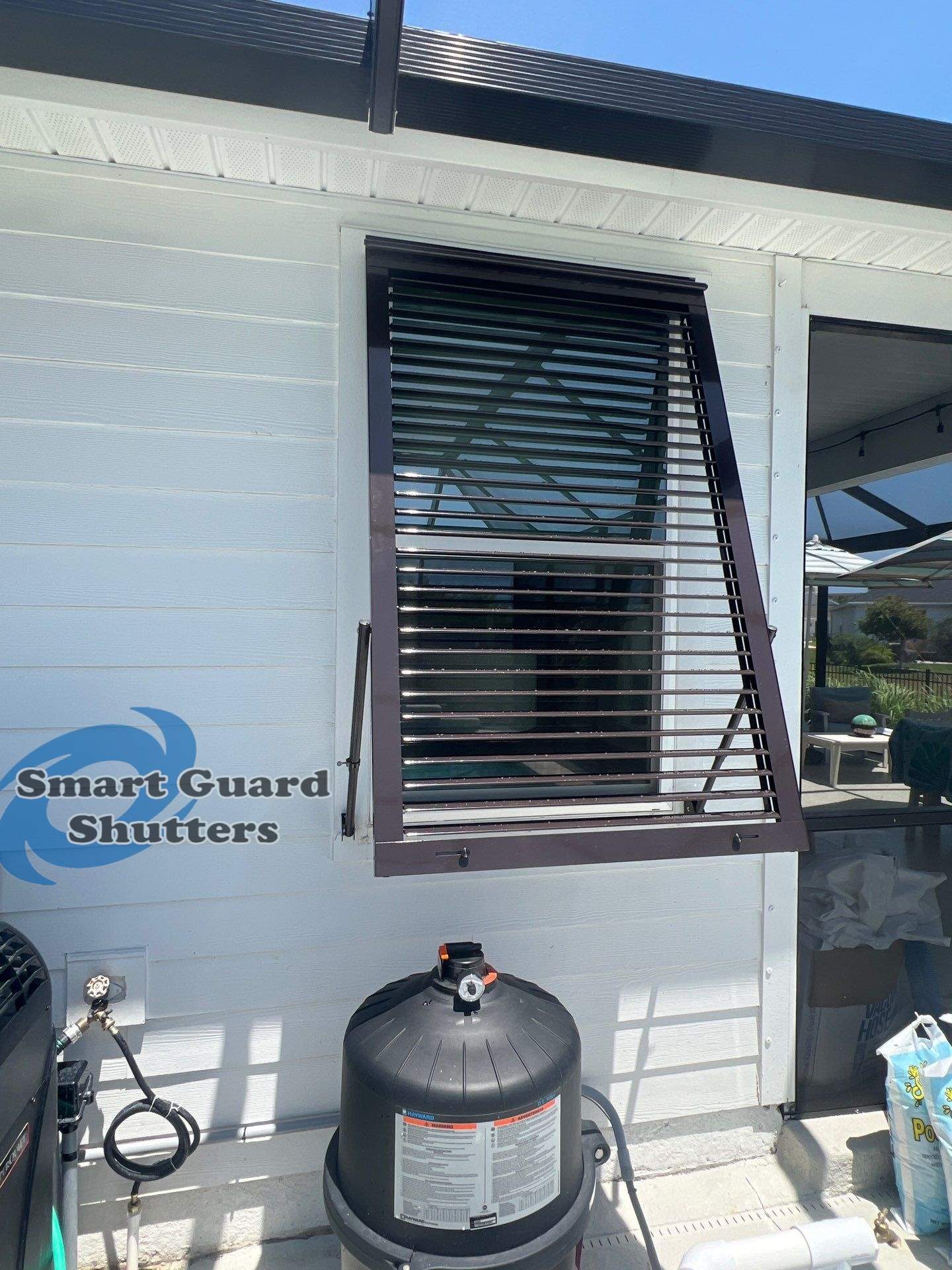 Impact Bahamas In Grey Brown by Smart Guard Shutters