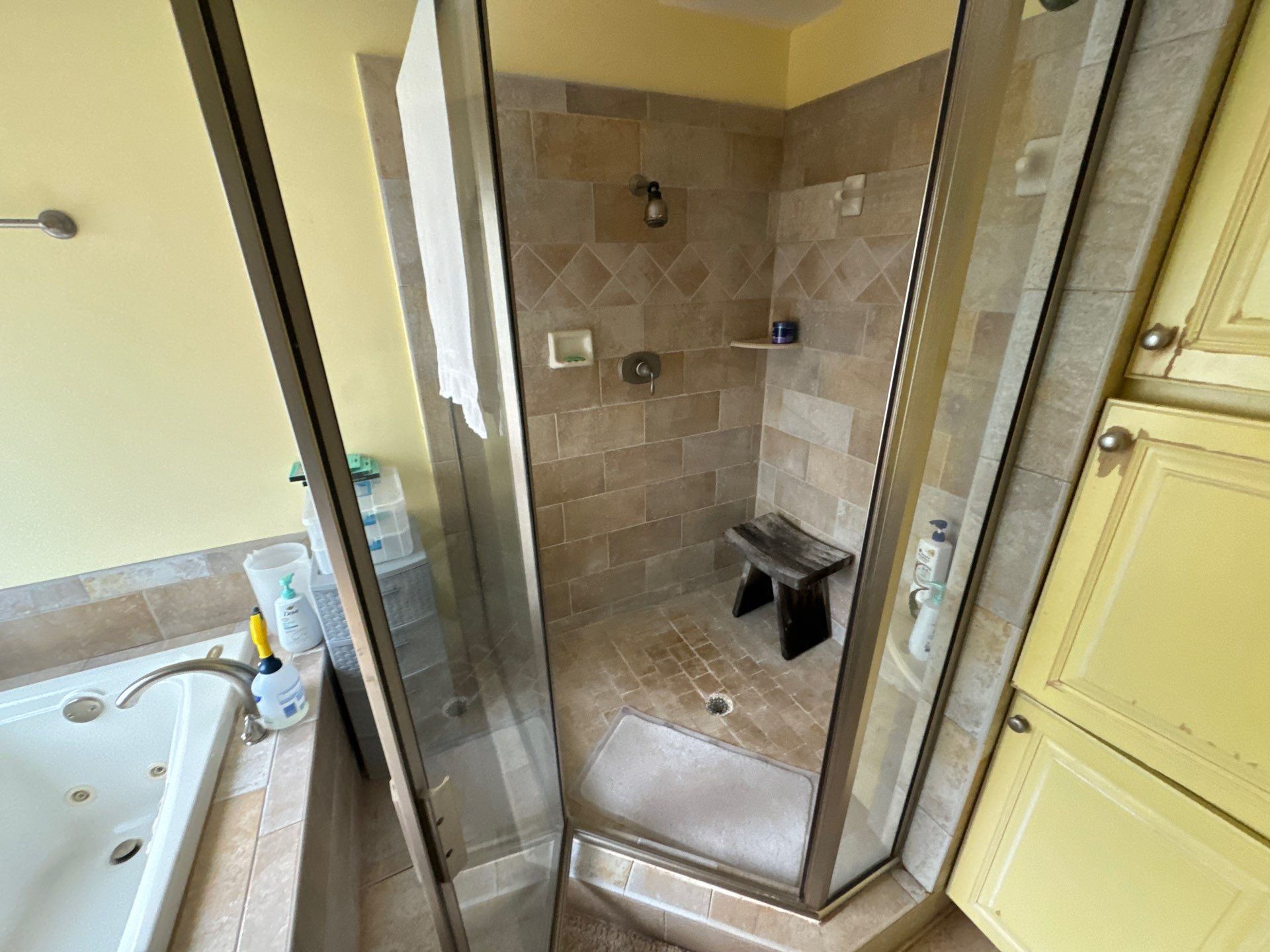 Master bathroom shower renovation, and tile flooring by Prudencio