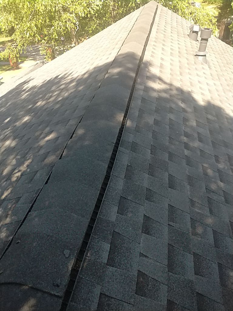 Residential Roofing Installation using Roof Replacement by American Roofing & Construction LLC