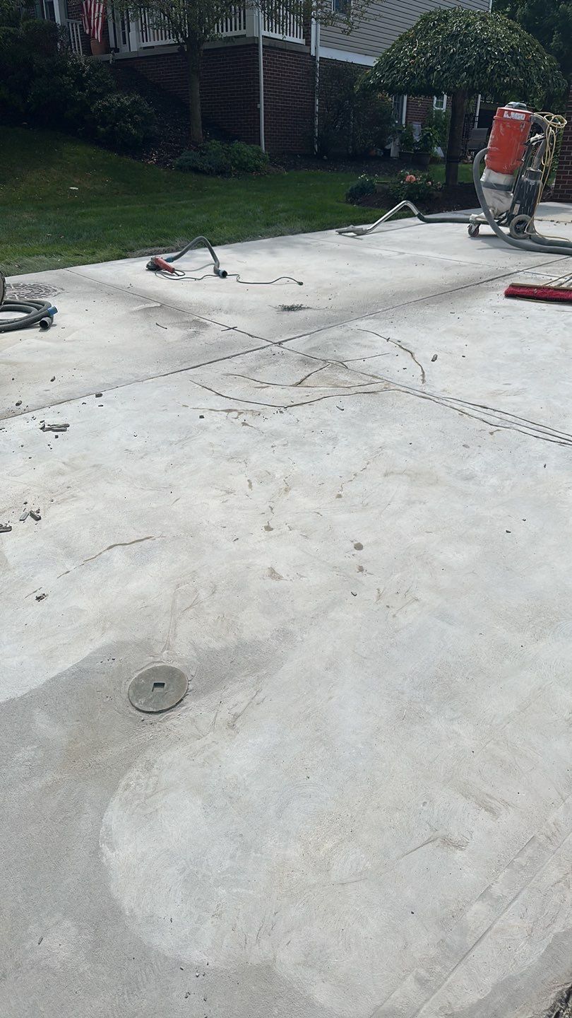 Pool Deck + Driveway + Garage Project in Venetia by Floors in a Day, Inc