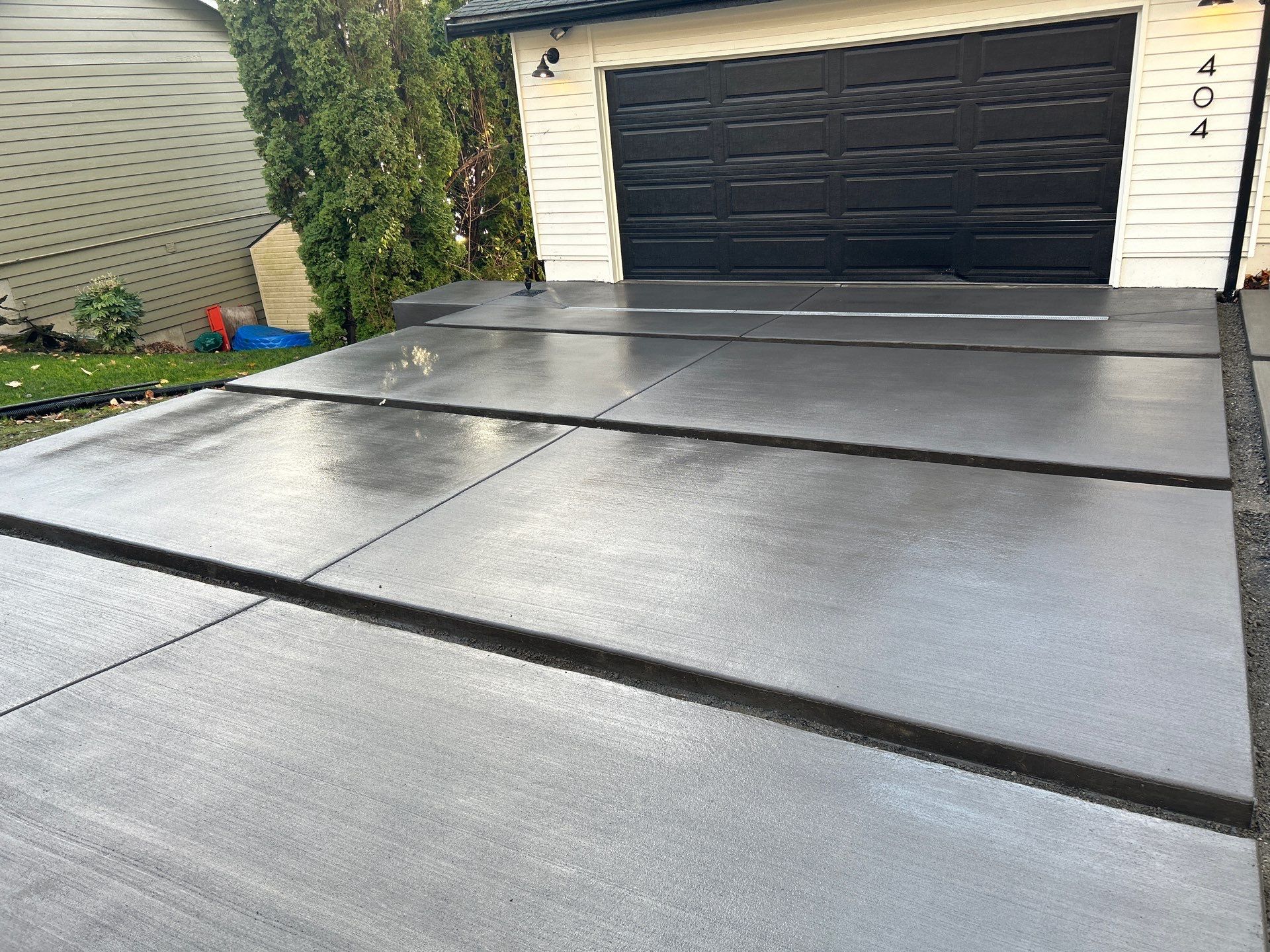 Raphil Haswega Concrete Driveway  by Jireh Asphalt & Concrete Inc 