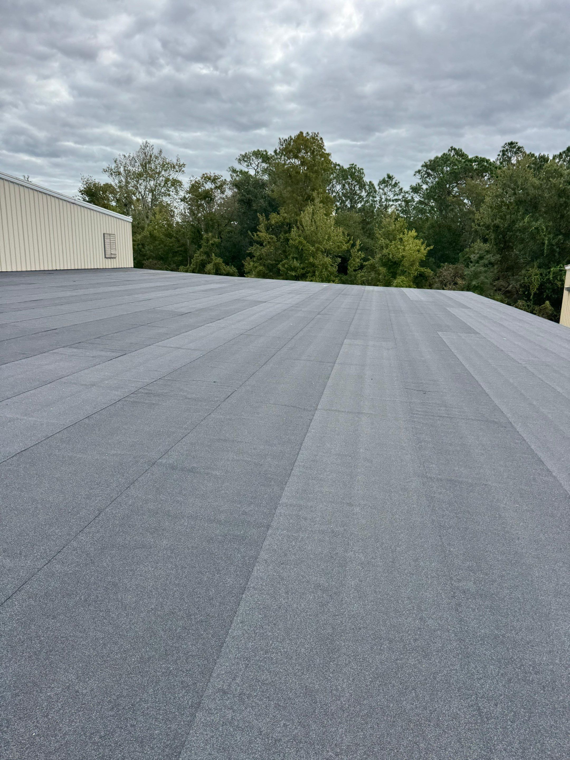 Flat Reroof Replacement Bunnell FL by Pinnacle Roofing Group