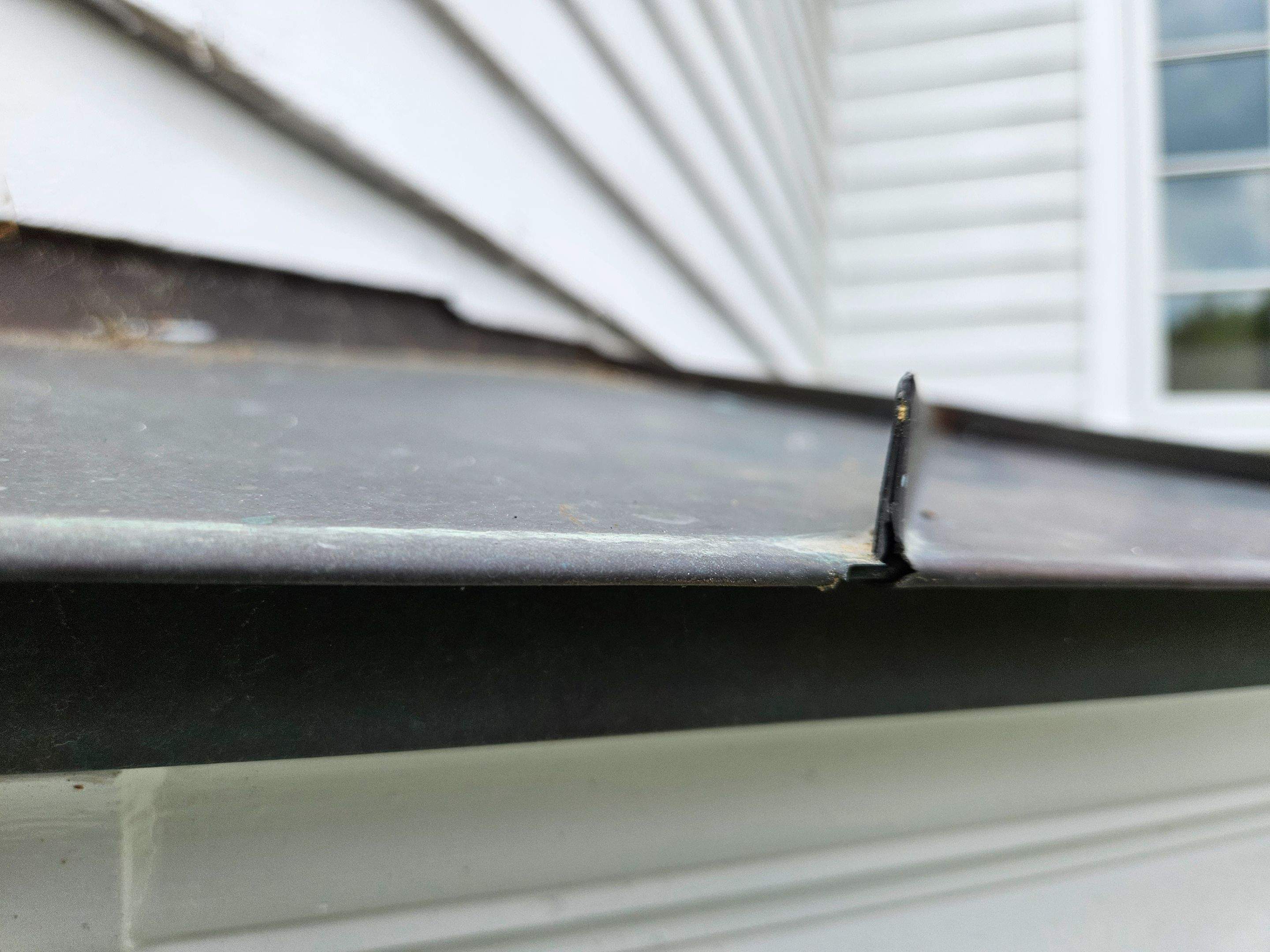 Copper Roof using Copper by Absolute Roofing and Construction