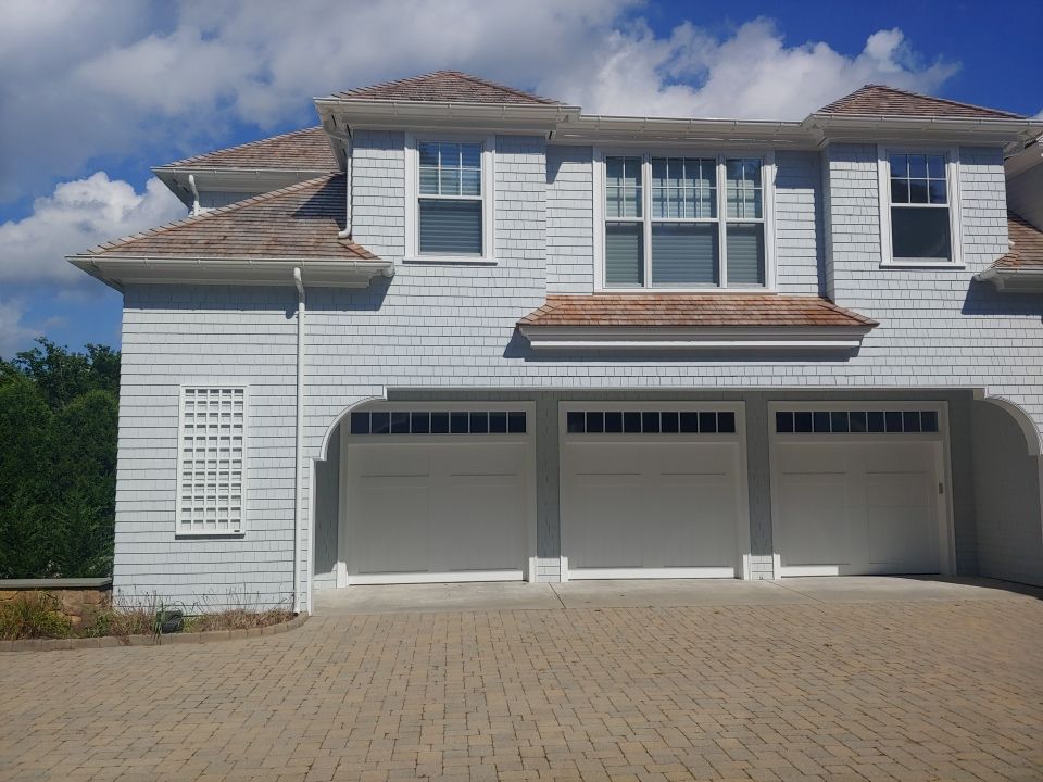 Gutter Installation using 6" Half Round Aluminum Gutter over Crown Moulding by Gutter Pro Enterprises