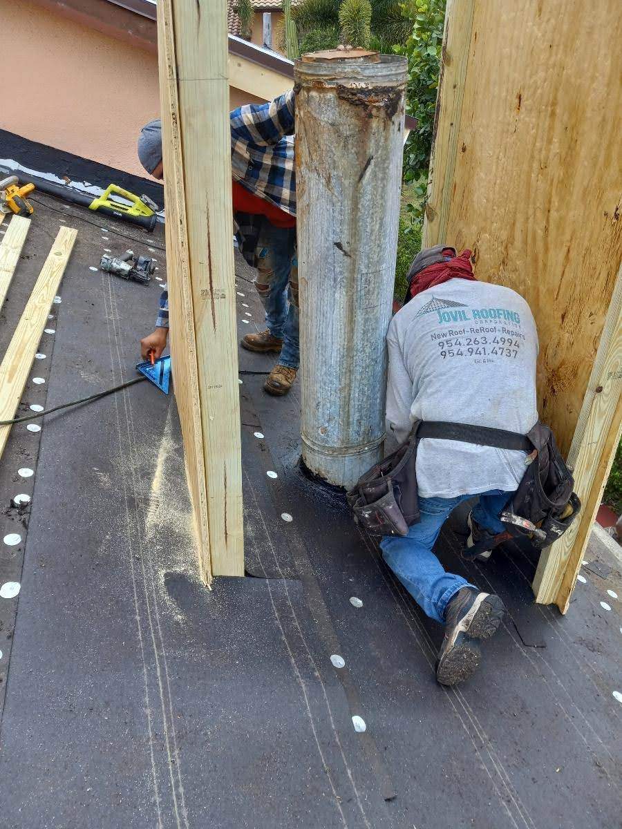 Complete Chimney Rebuild + Tile & Flat Re-Roof  by Morton Roofing, Inc.