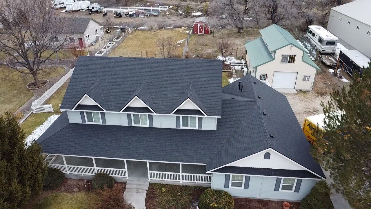 Big Style in Mission Pointe – New Roof with DecoRidge & Onyx Black Finish by ID Roofing LLC
