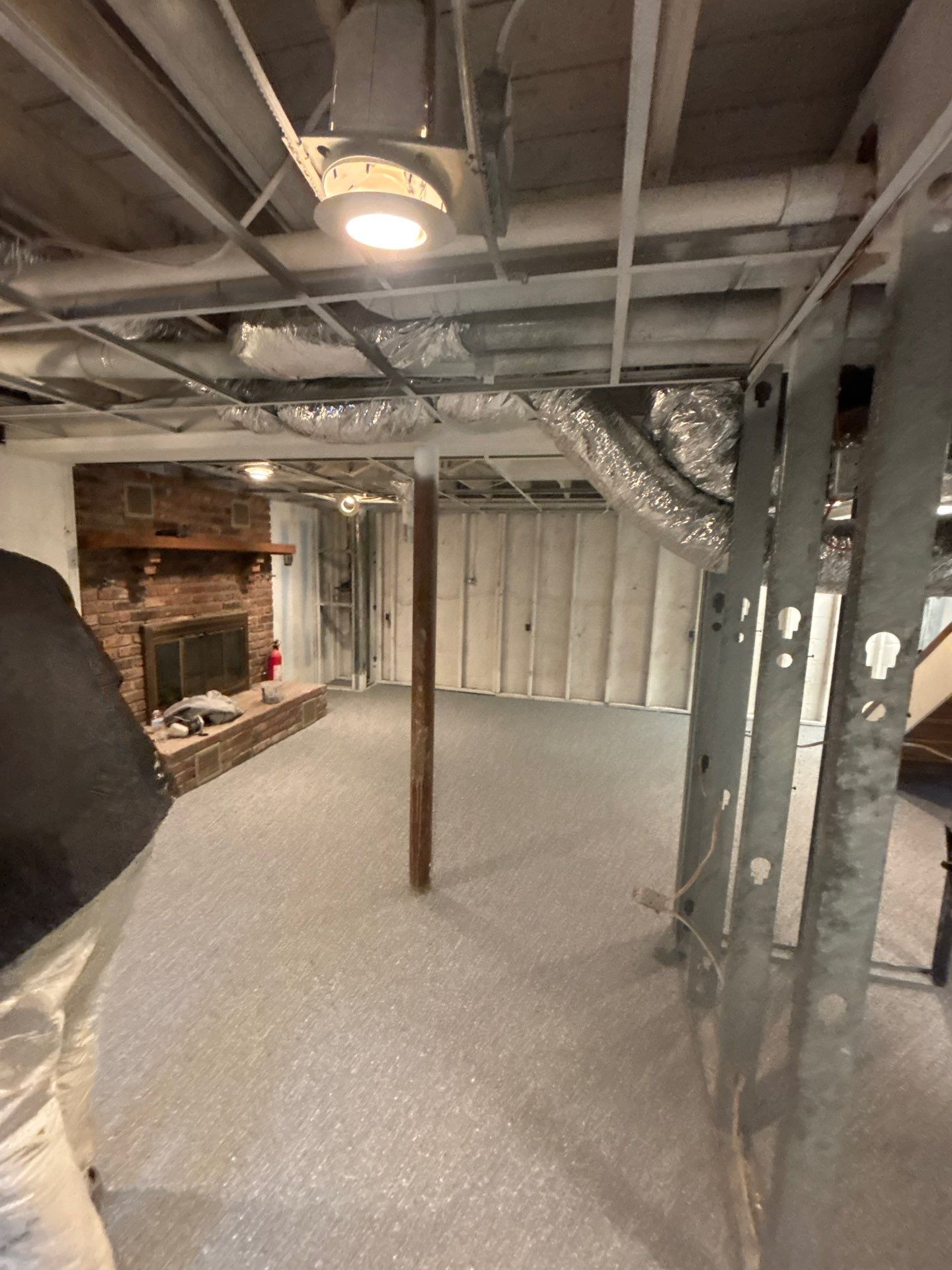 Basement Concrete Floor Coating with Penntek Flake System by Spectrum Painting, LLC