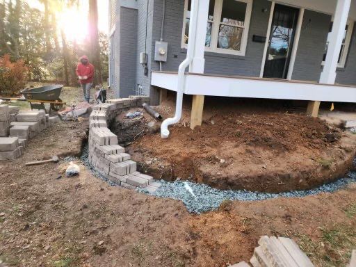 Retaining wall, walkway, small patio and landscape install  by The Smet Companies, LLC