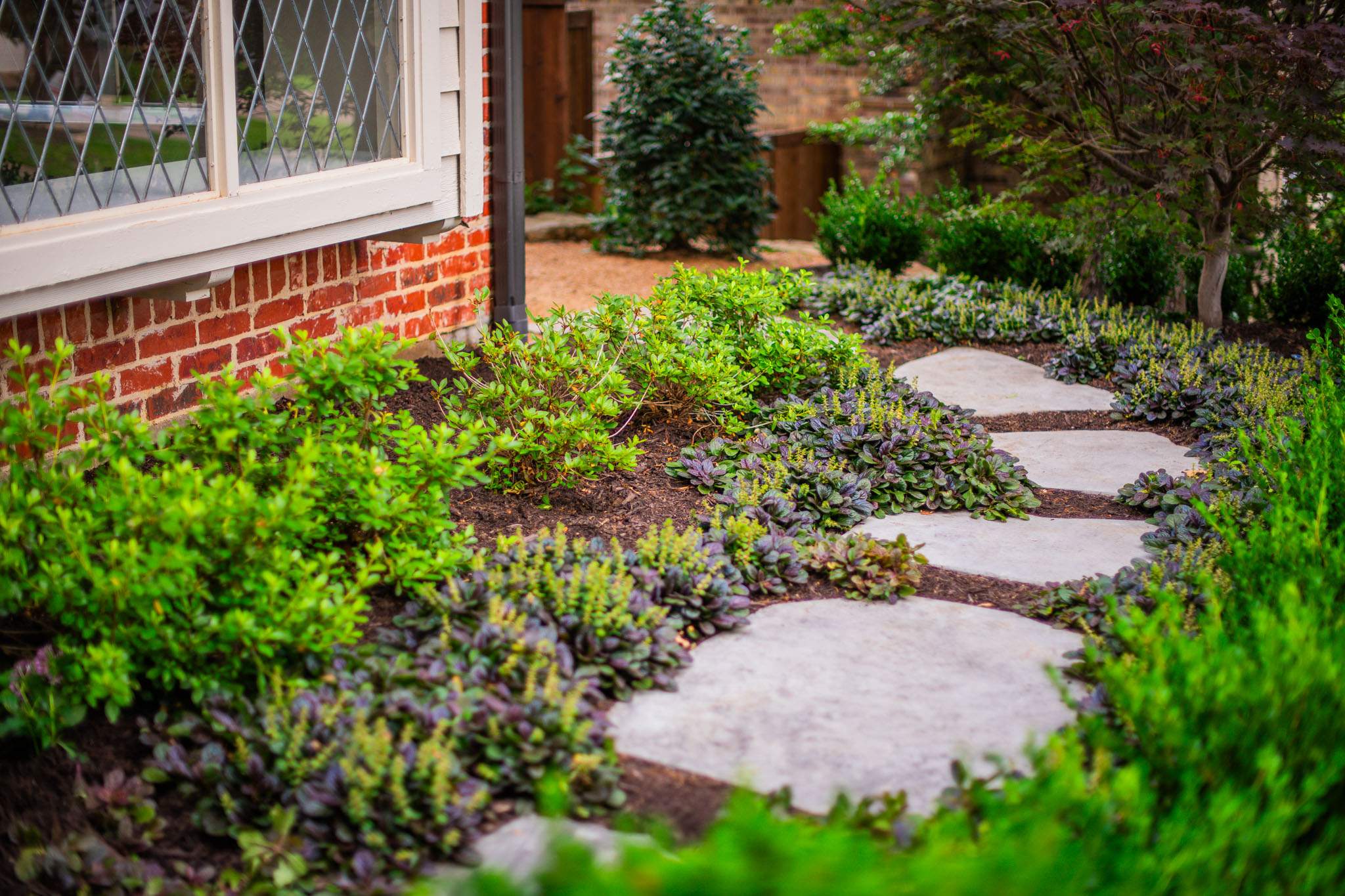 Southern Charm: Revitalizing a Cottage Garden by Complete Exterior Solutions