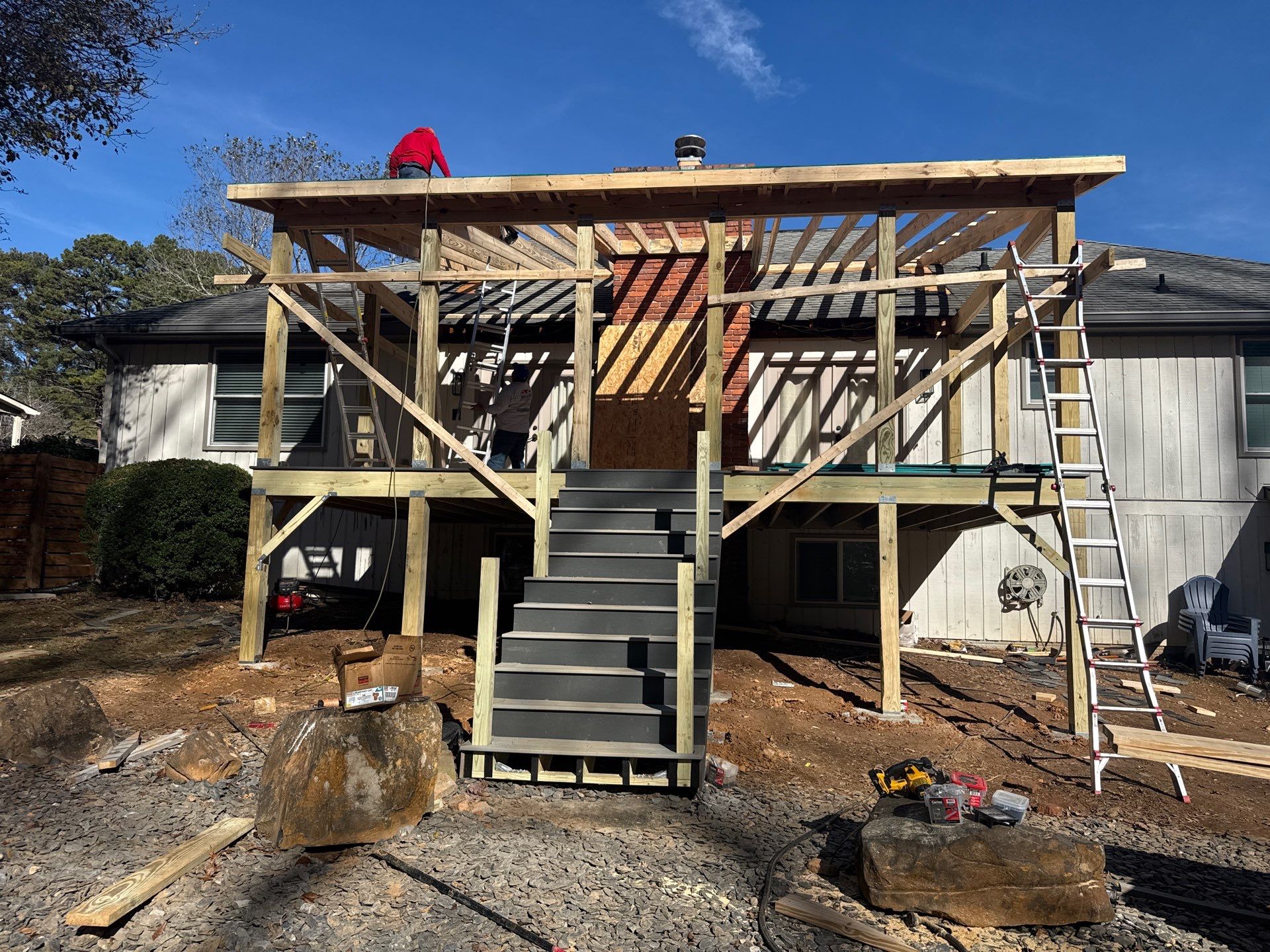 Deck and Shed Roof Style Covered Build using Trex Decking Products by Nelson Exteriors 