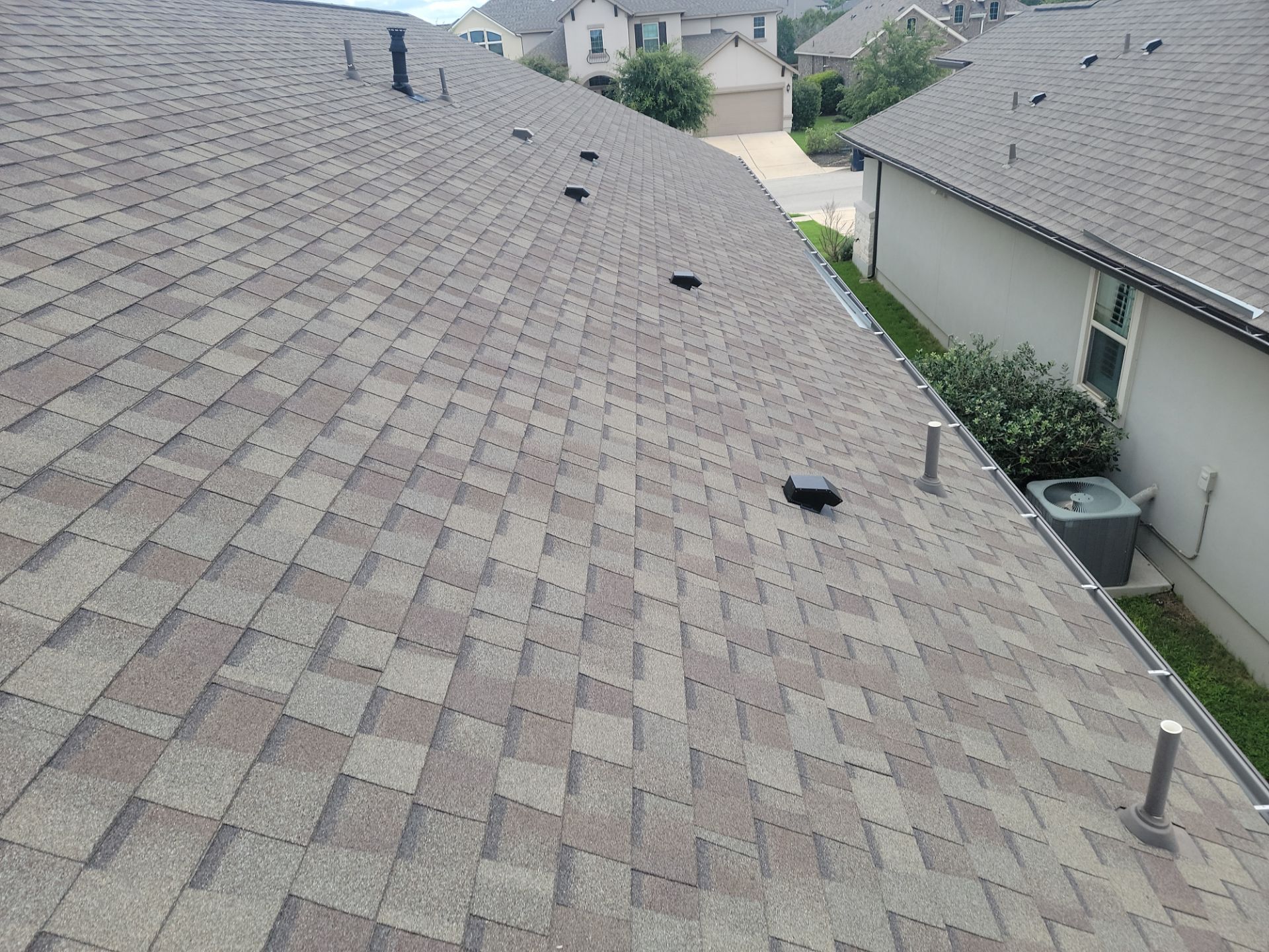 Residential Roof Replacement using Malarkey - Vista AR - Weathered Wood Plus by Action Exteriors Austin