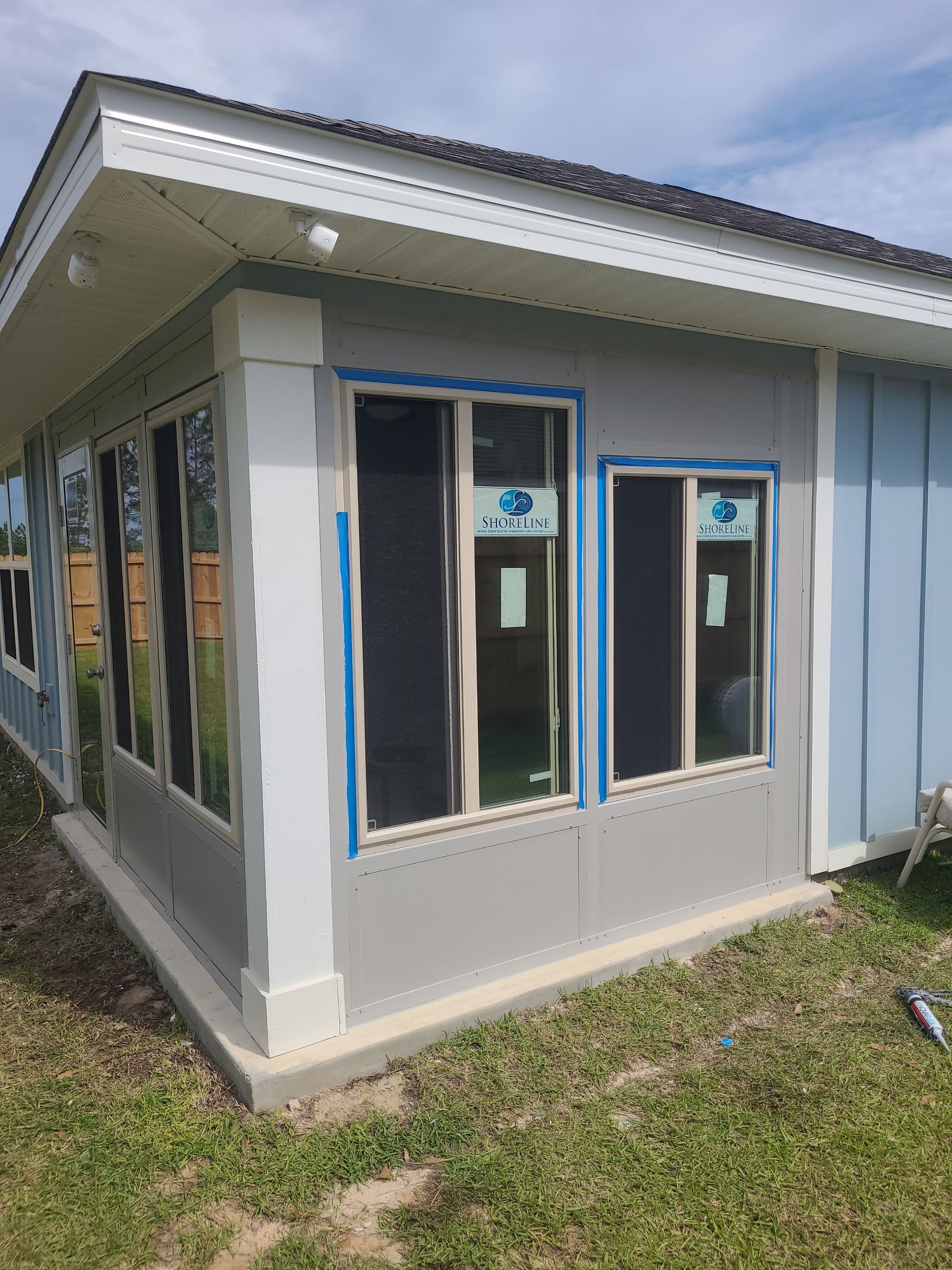 Screen Under Glass Room in Crestview by Titan Sunrooms