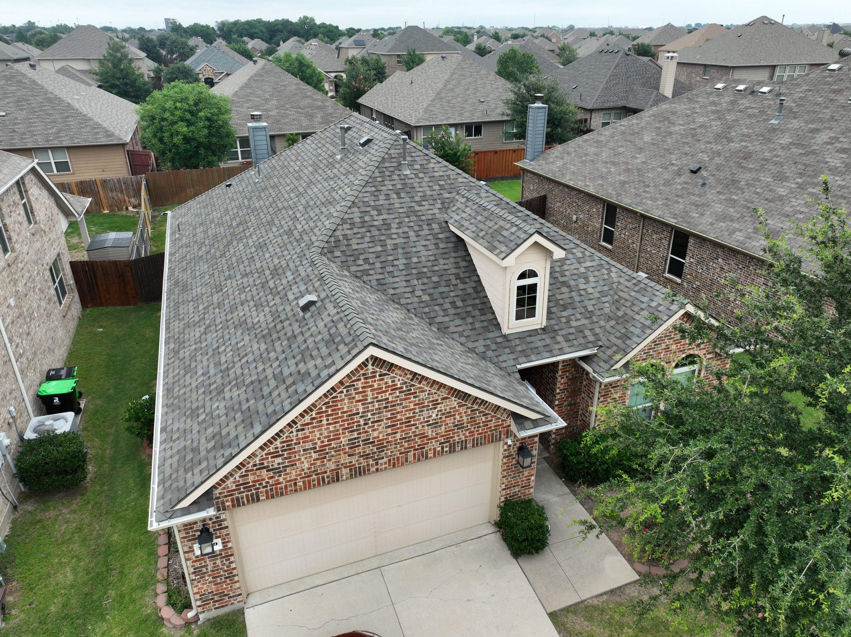 Residential Roofing Installation using CertainTeed Landmark MaxDef Weathered Wood by OneSource Roofing and Restoration