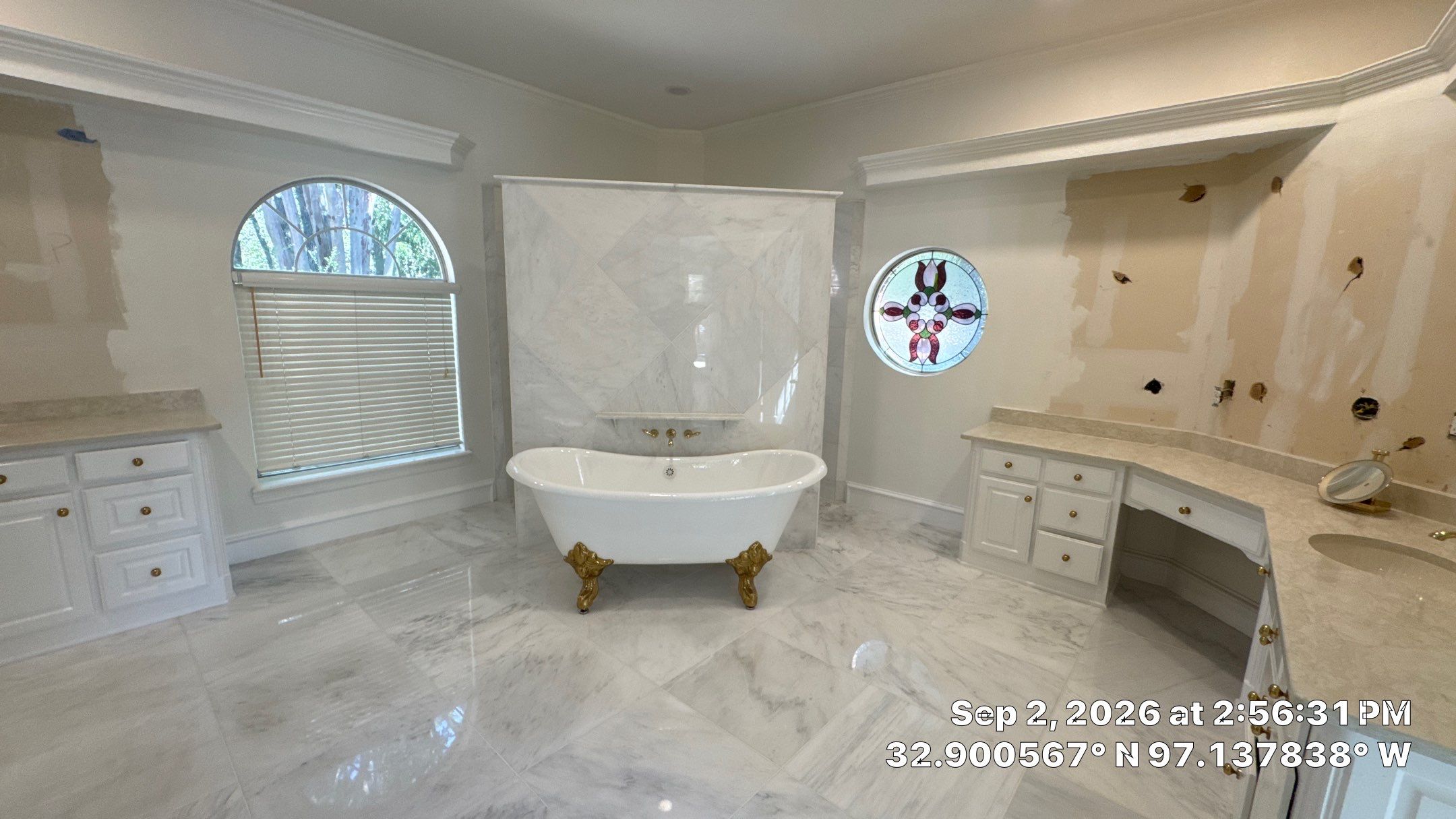 Luxury Interior Renovation with Marble Flooring and Custom Master Suite by Springtree Restoration