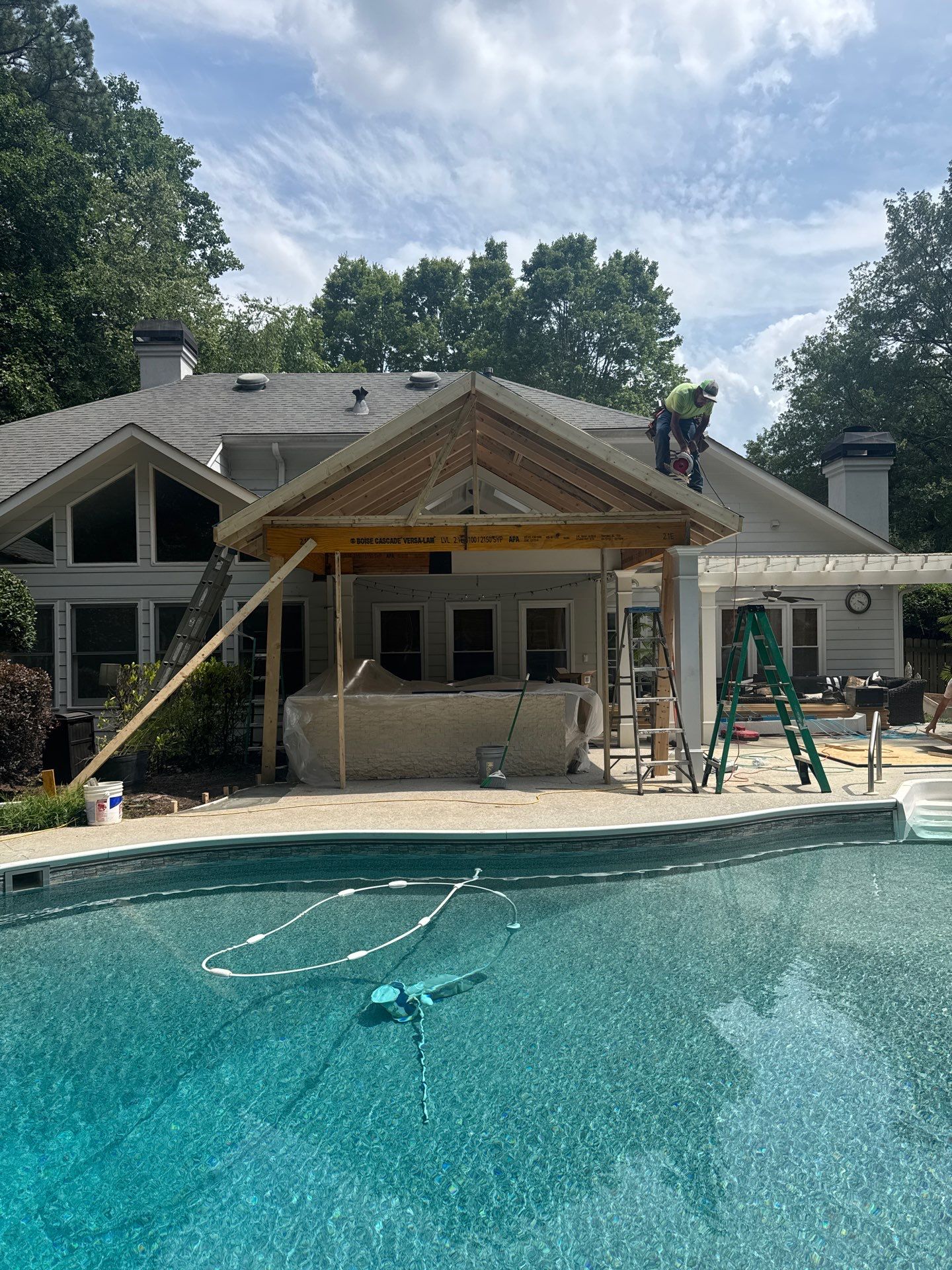Marietta Poolside Pavilion with Custom Outdoor Kitchen and Pergola by Swift Home Renovations