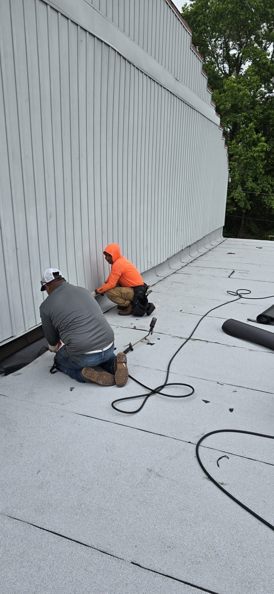 Roof Installation using Silicone APP Elevate Coating by ExteriorPros