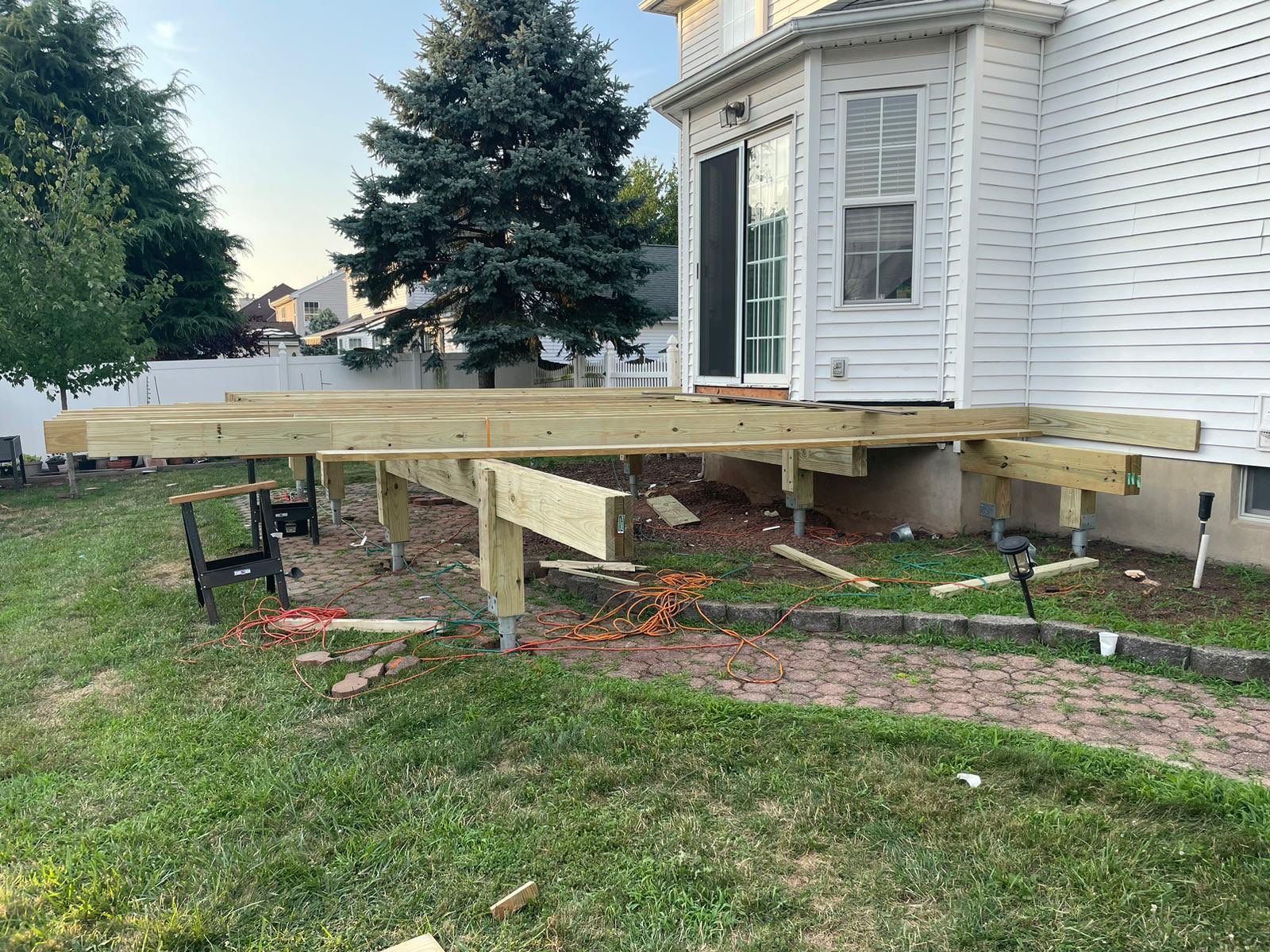 New Deck with Pergola and Vinyl Lattice by deck guardian