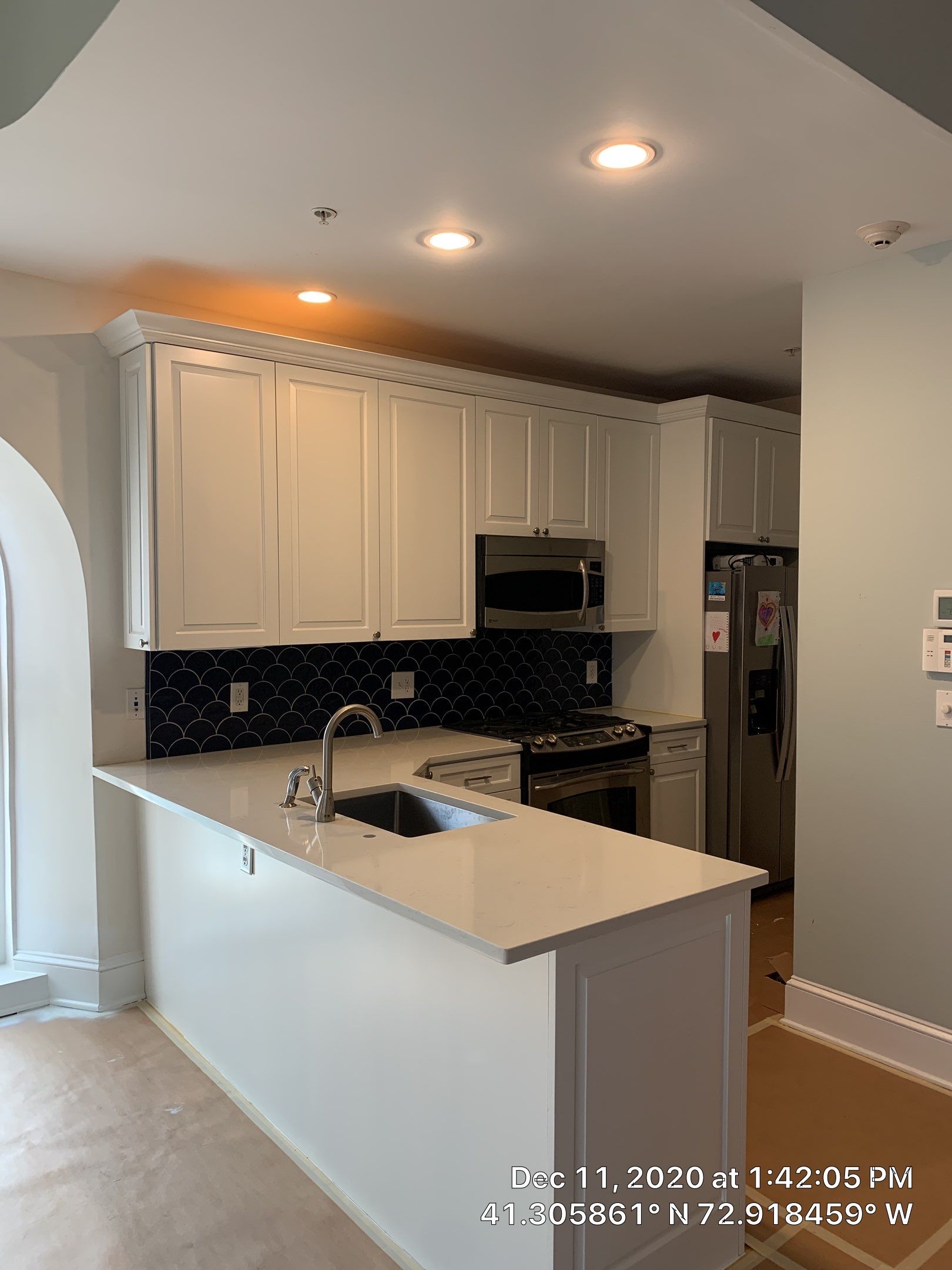 Kitchen Cabinet Painting using Milesi 2k by Trendy Walls Inc.