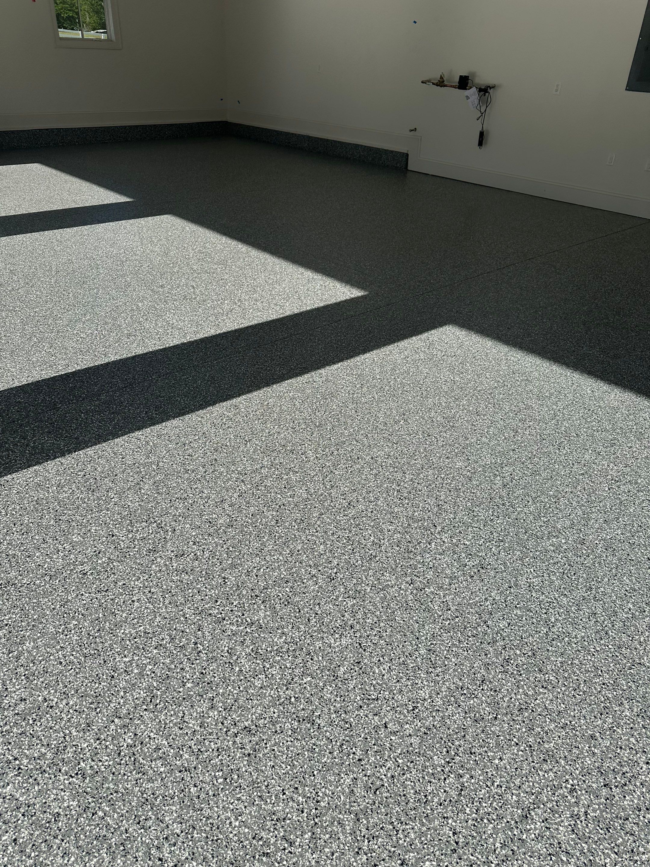 Garage Floor Coating using Wombat by My Garage Floor Guys