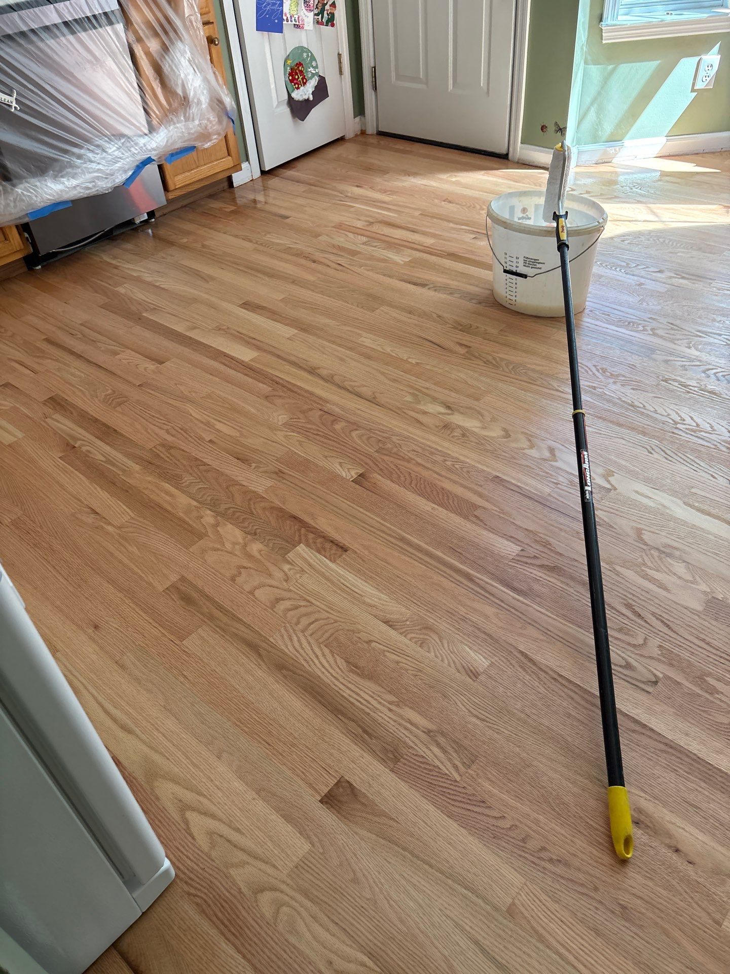 Refinishing an old Bruce prefinished hardwood floor by Accent Custom Floors