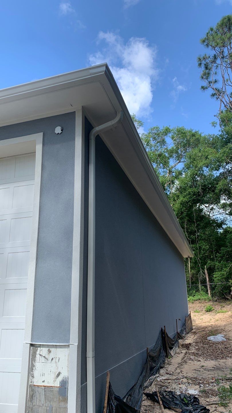 Seamless Aluminum Gutter Installation using 6 Inch Seamless Gutters in MIlton FL by Gutter Professors