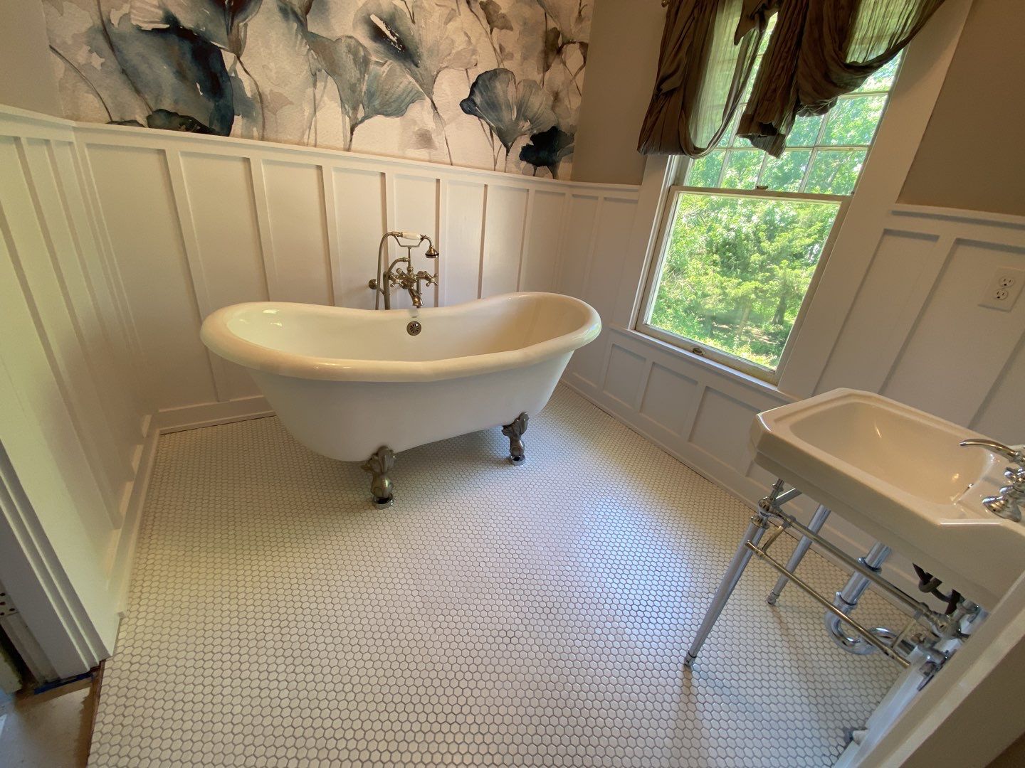 Historic Home Built in 1900 Bathroom Remodel by SLM General Contractors & Roofing