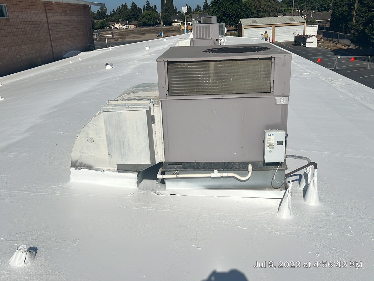 MR Roofing system using Benchmark/PUMA XL coatings over TPO single-ply roofing by Straight Edge Roofing Inc