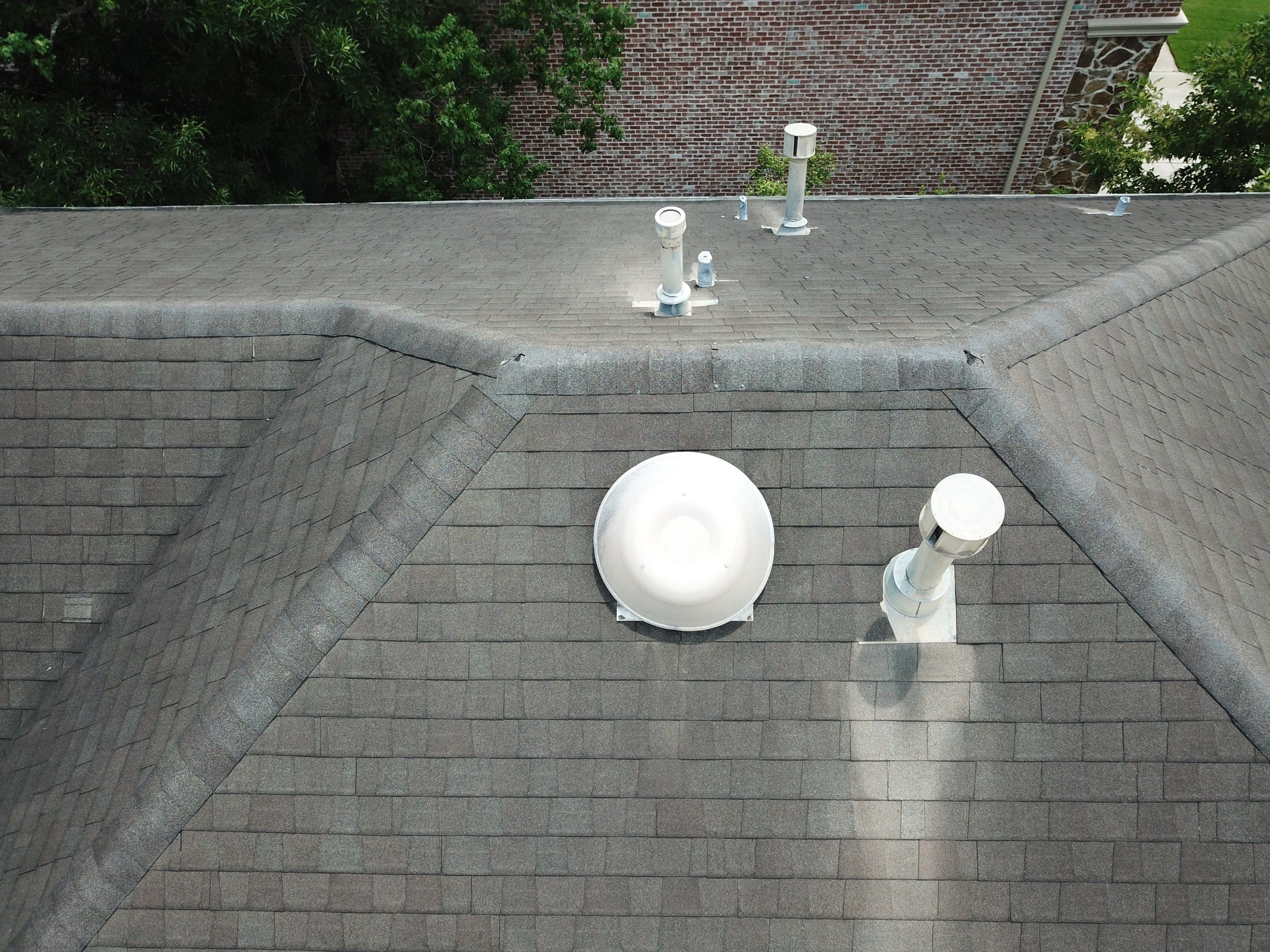 OC Duration Moire Black by HHH Roofing & Construction