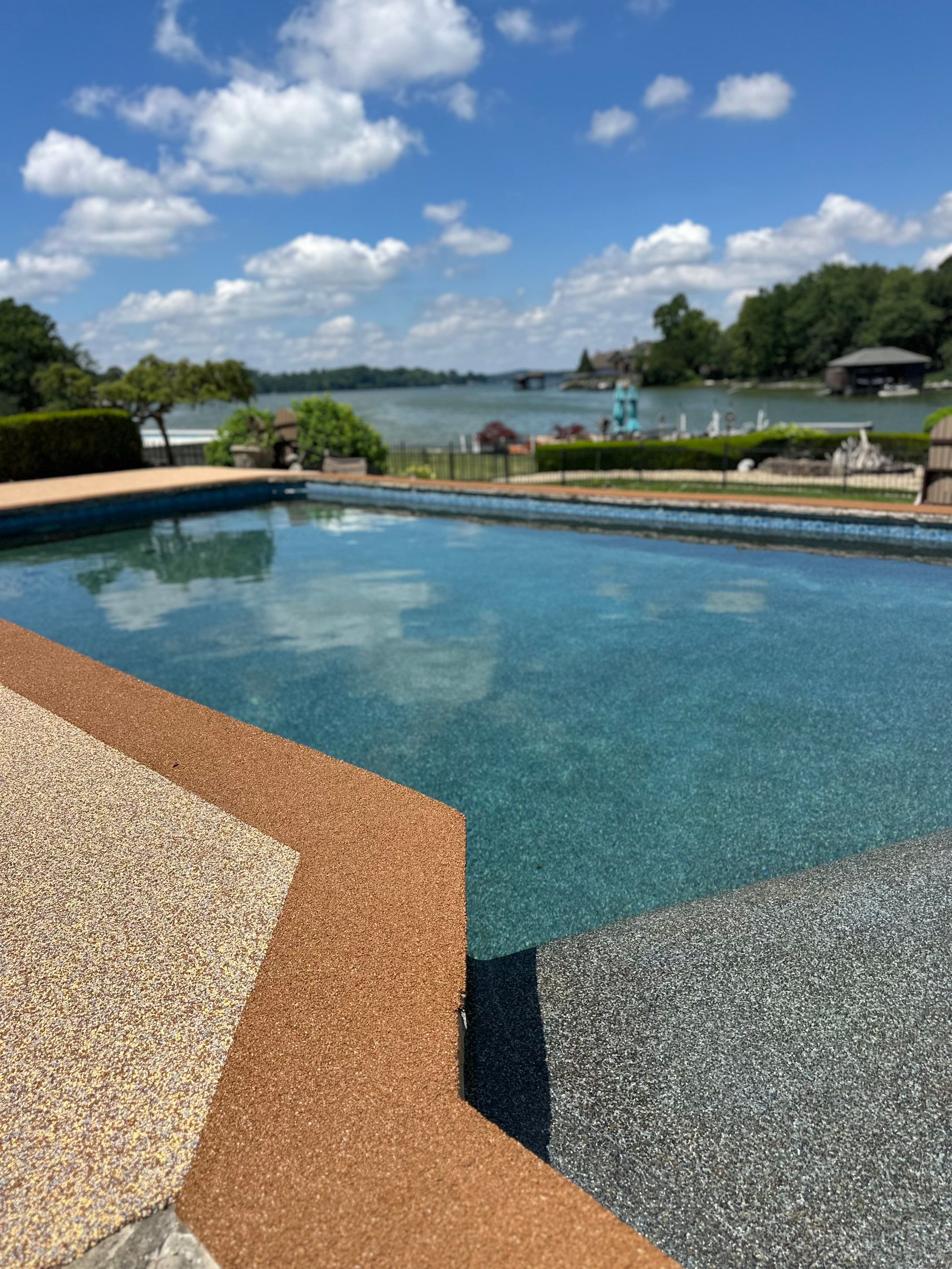 Lakeside Pool Resurface — Sandstone Rubaroc® with Medium Brown Border by Elite Floor Solutions