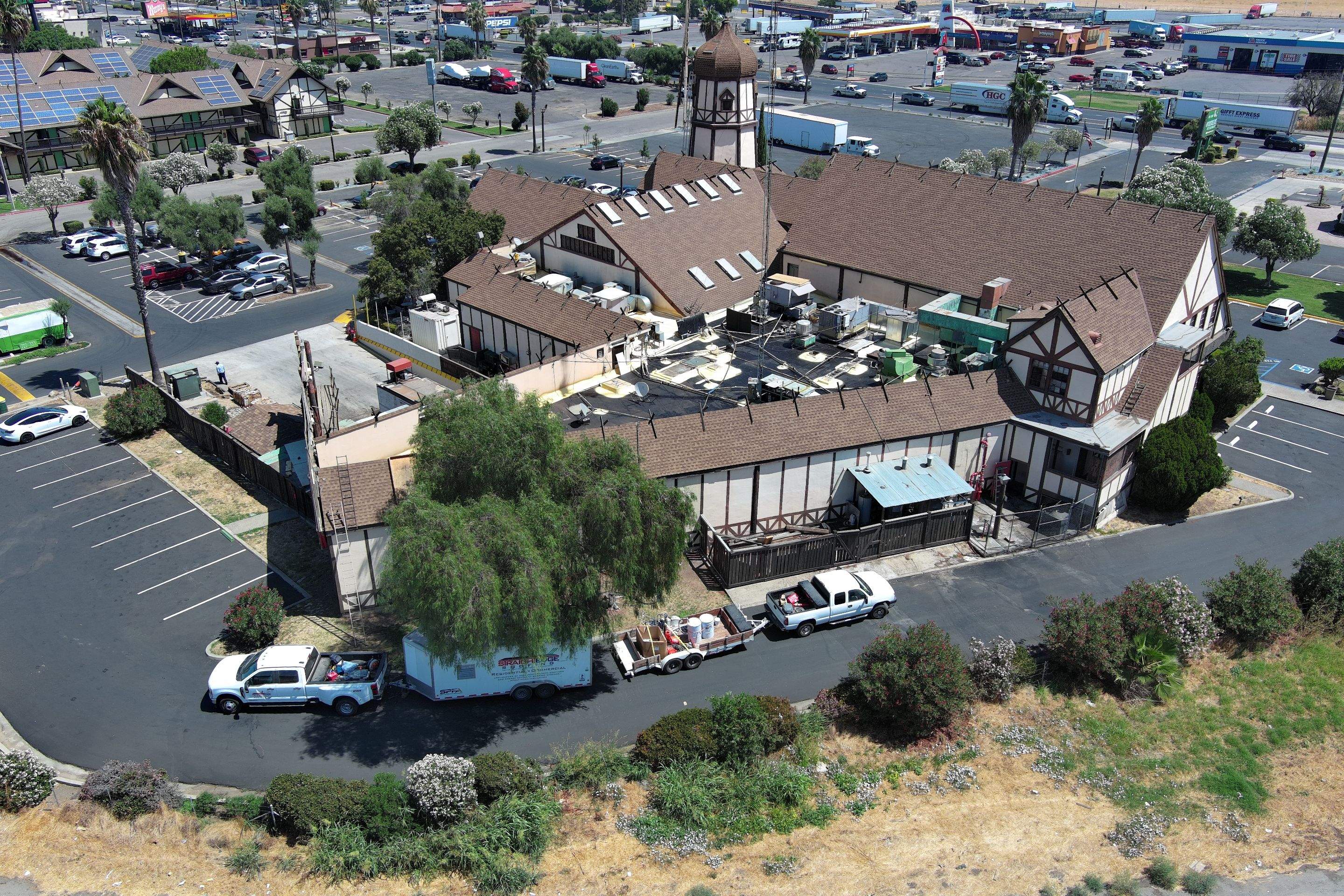 Spray foam and coatings using General Coatings acrylic coatings and spray foam by Straight Edge Roofing Inc