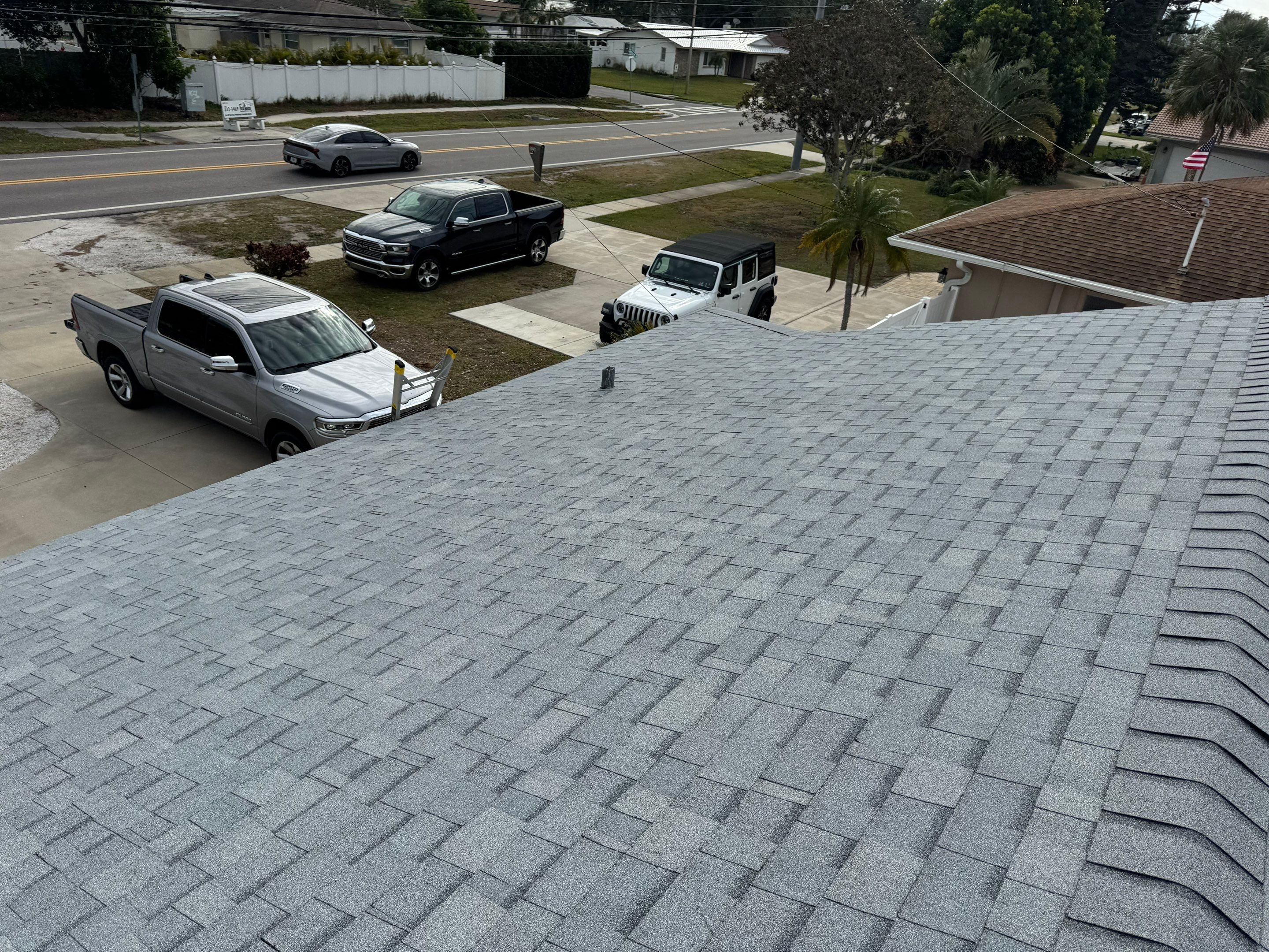 Estate Gray Shingles by Reimagine Roofing