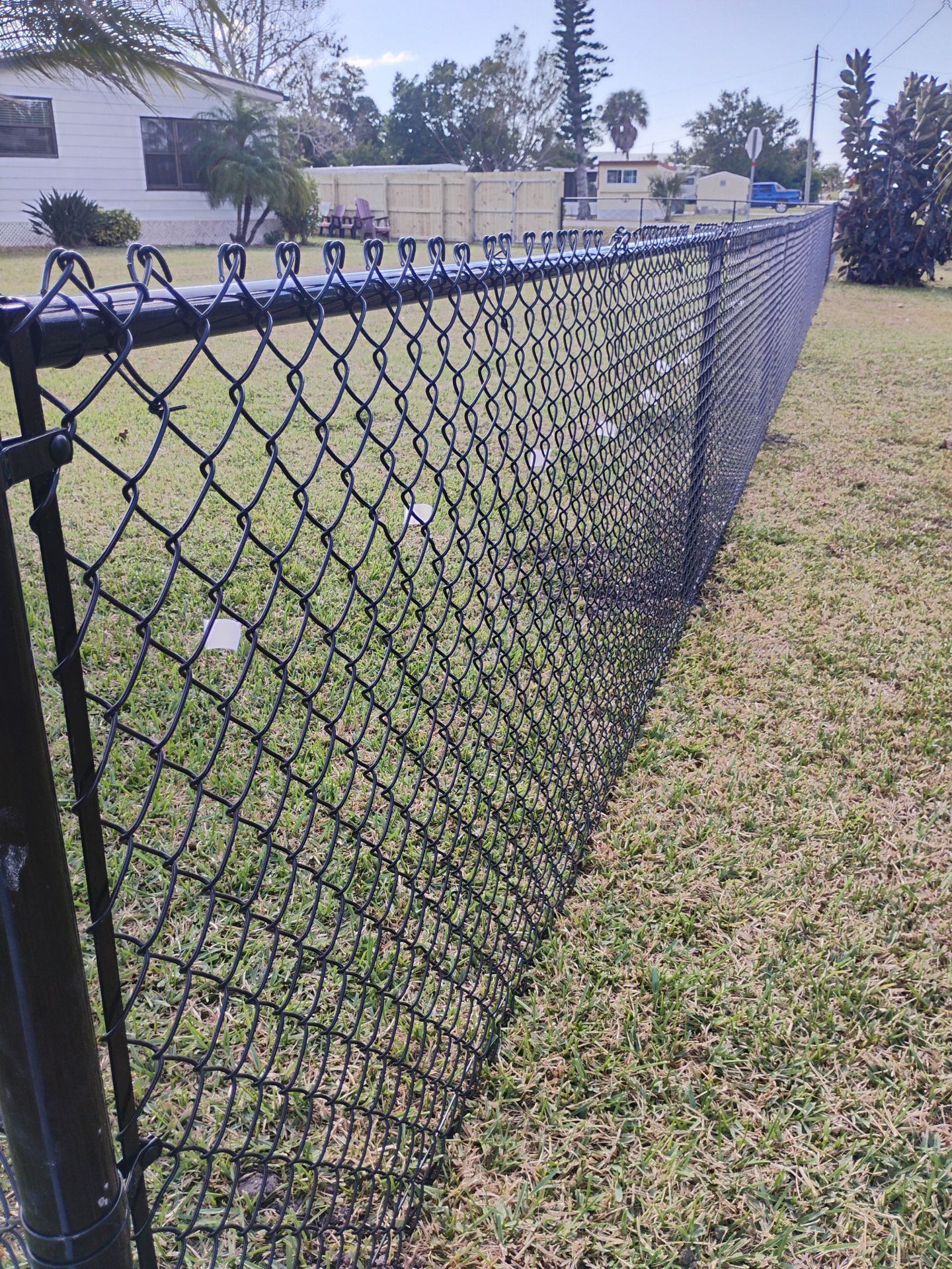Wood and Chain Link Fence in Port Charlotte by True Fence LLC