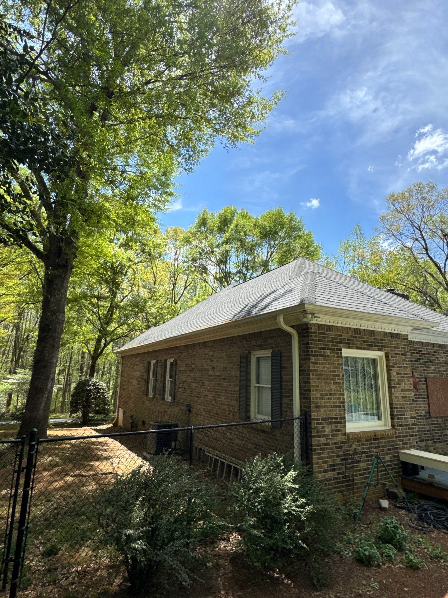 Spartanburg Residential Roof Replacement with Architectural Shingles and Skylights by Roofers LLC