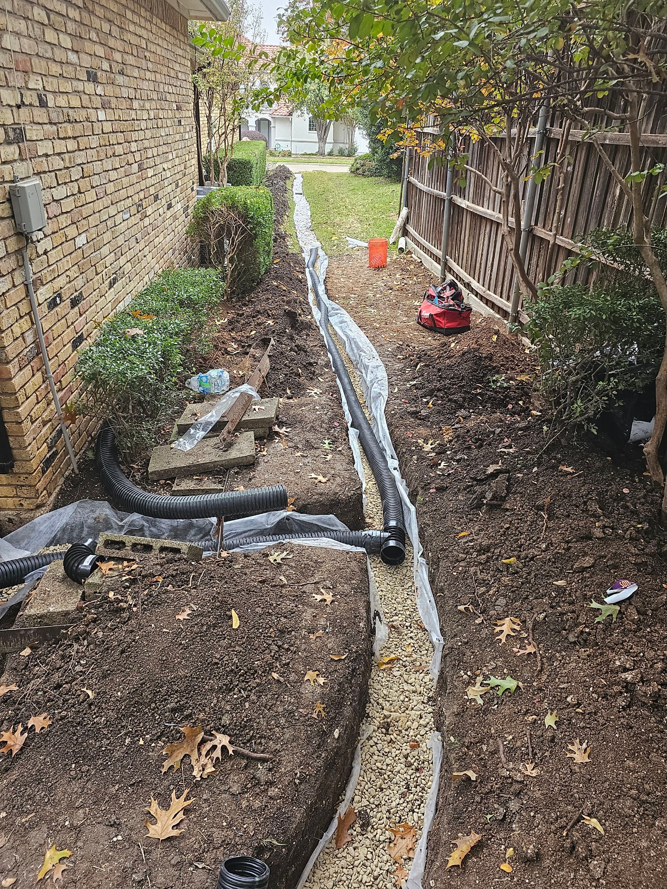 French Drain & Retaining Wall by EL-GC LLC 