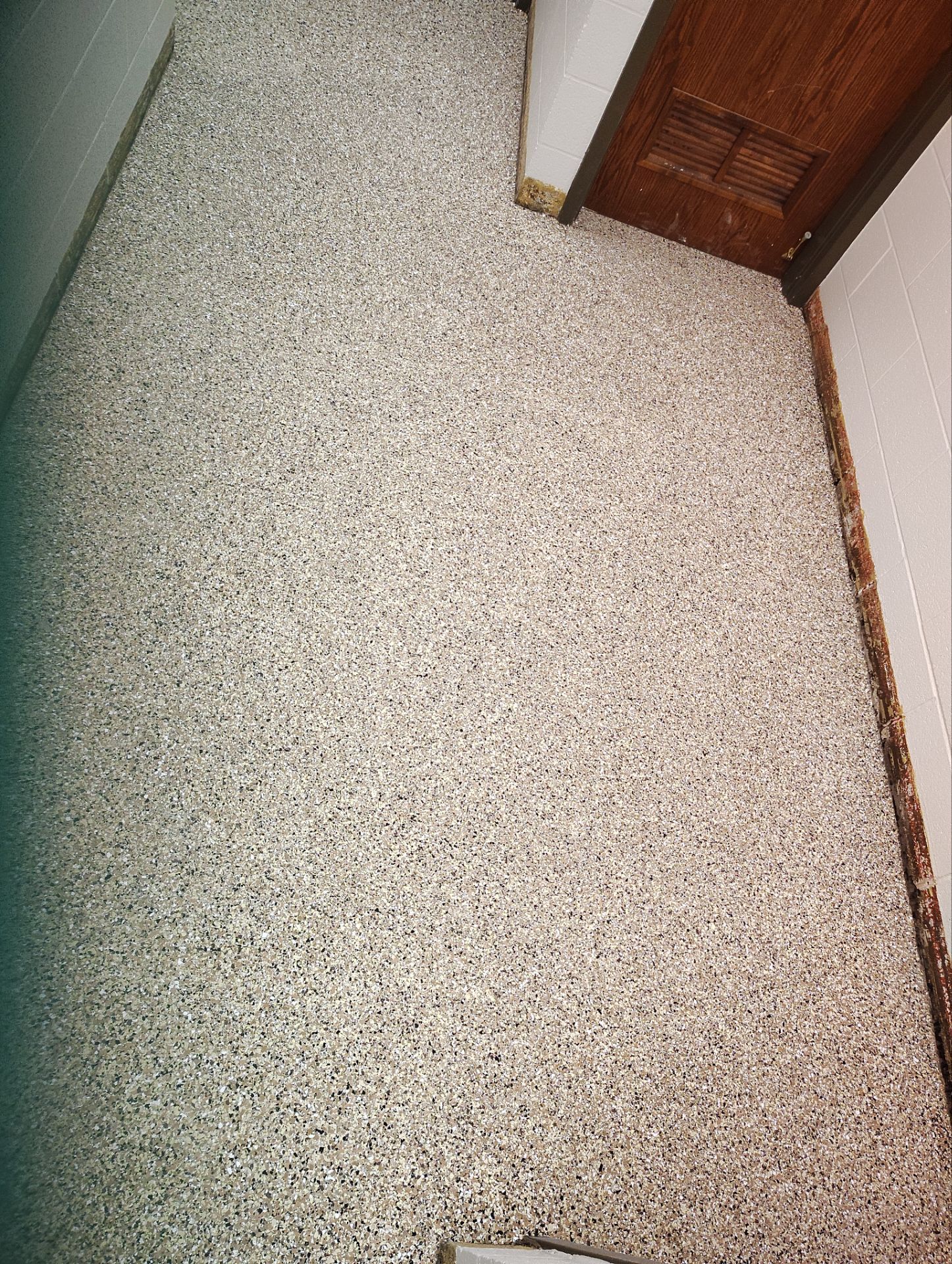 Industrial Flake Epoxy Floor Installation at Pierre National Guard Facility by Select Painting, Coatings & Garage Cabinets