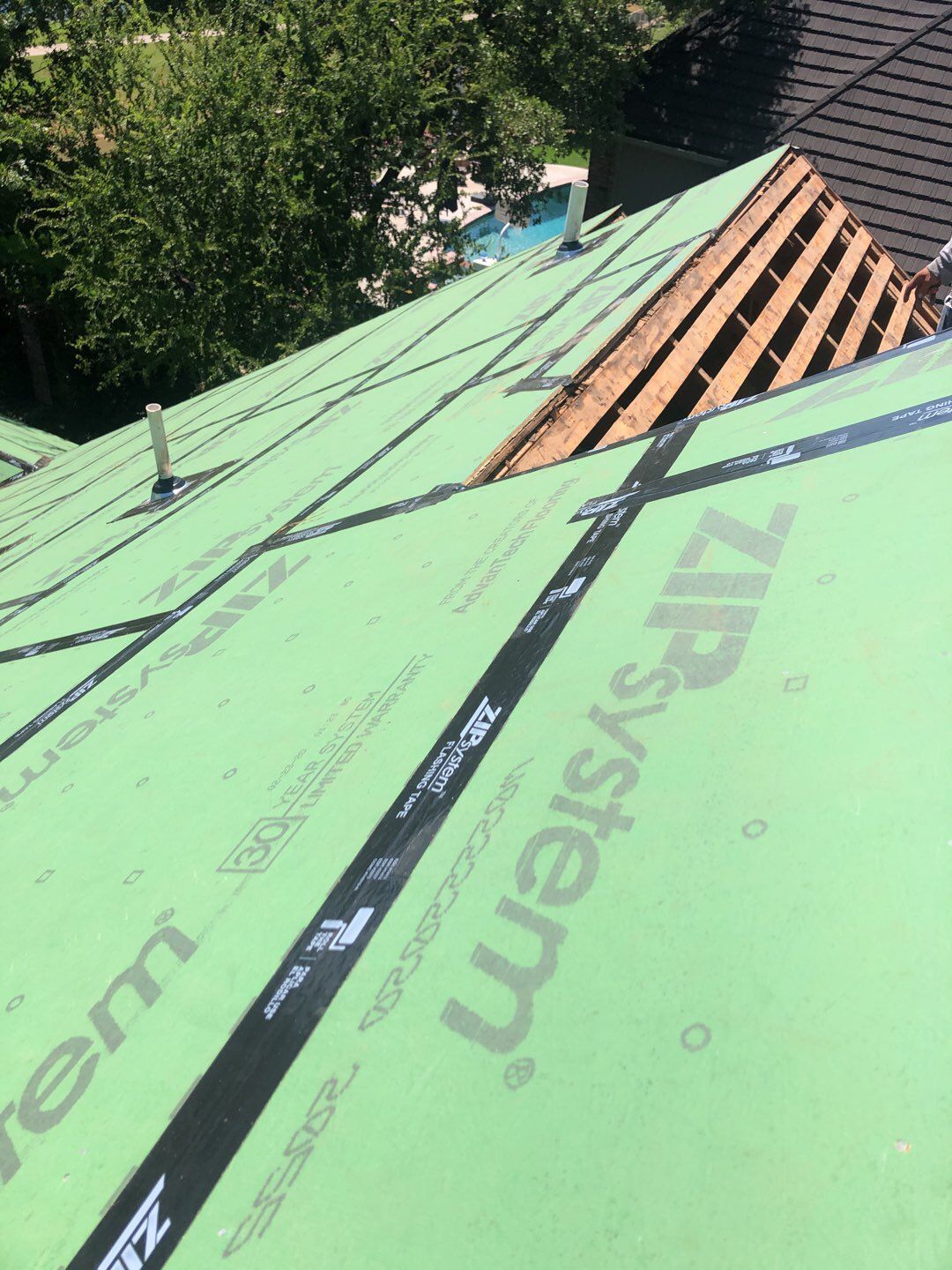 Designer Residential Roof with Zip System by Springtree Restoration