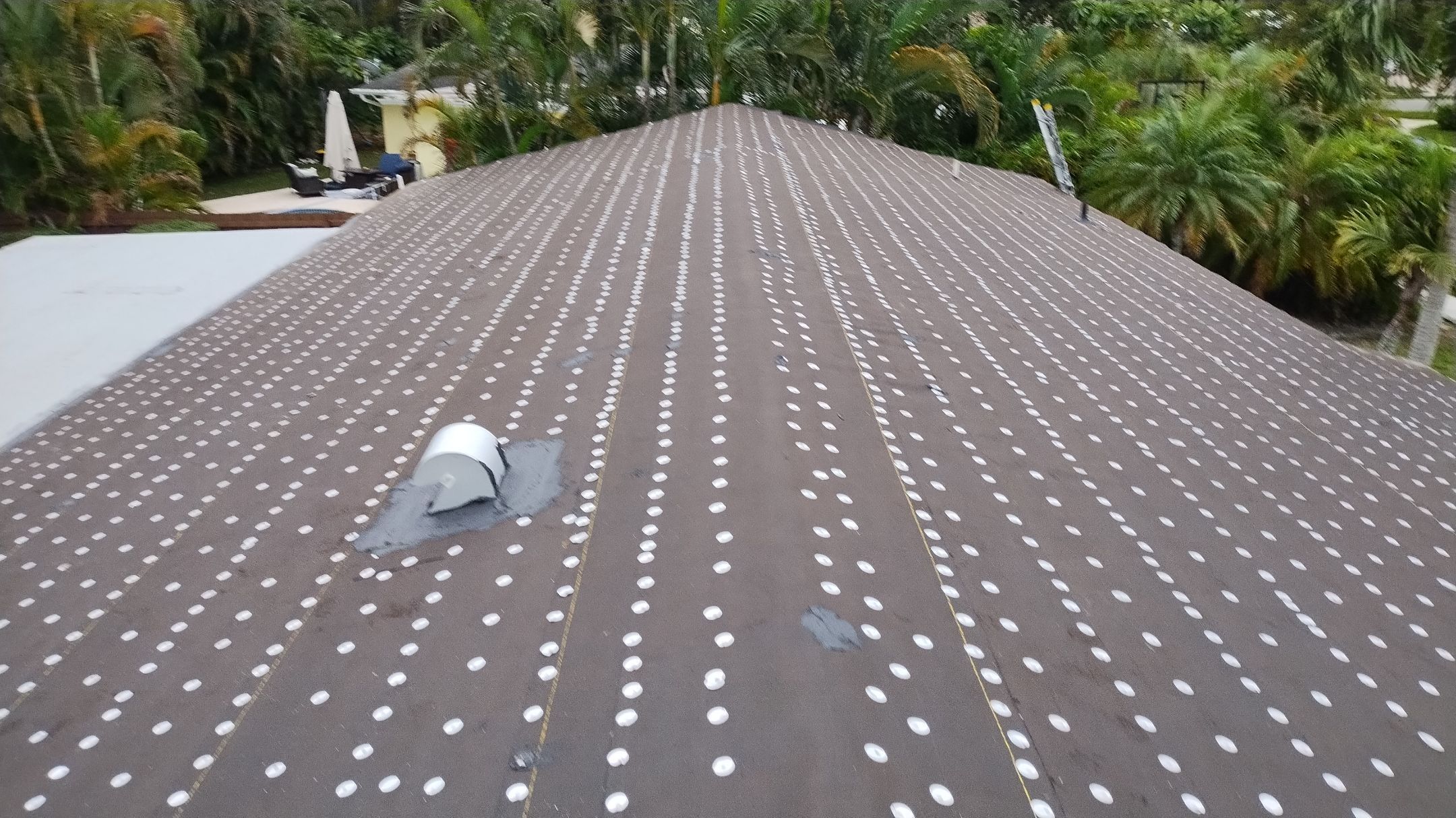 Residential Roofing Installation using 1" Nail strip metal roof by BLUES BROTHERS CONSTRUCTION CORP