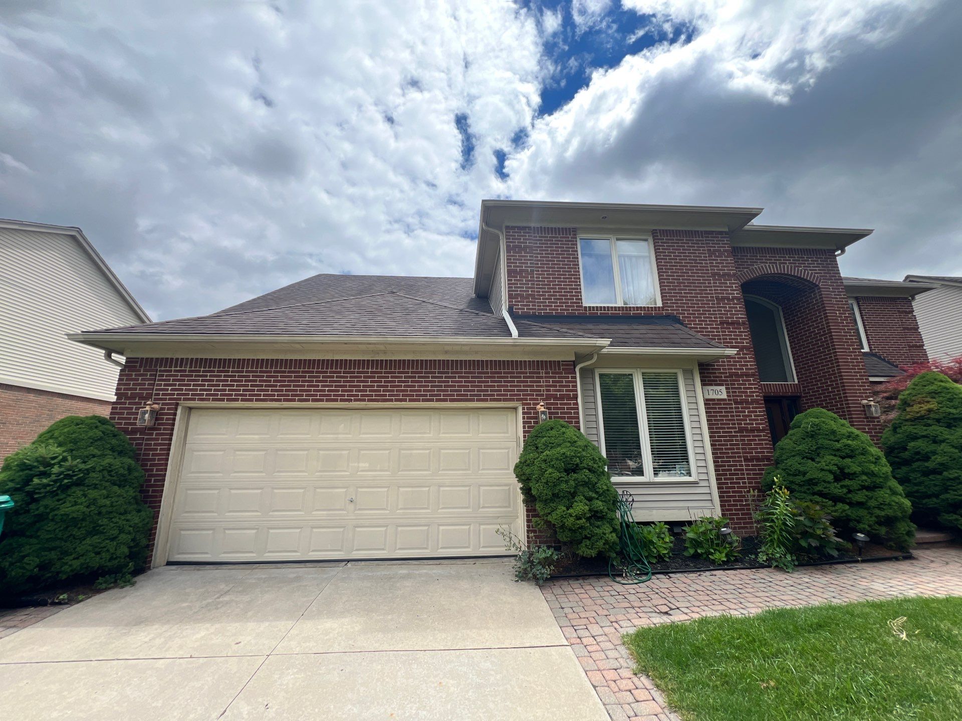 Vinyl Siding and Exterior Trim Painting in Commerce Township by Top Shelf Painter