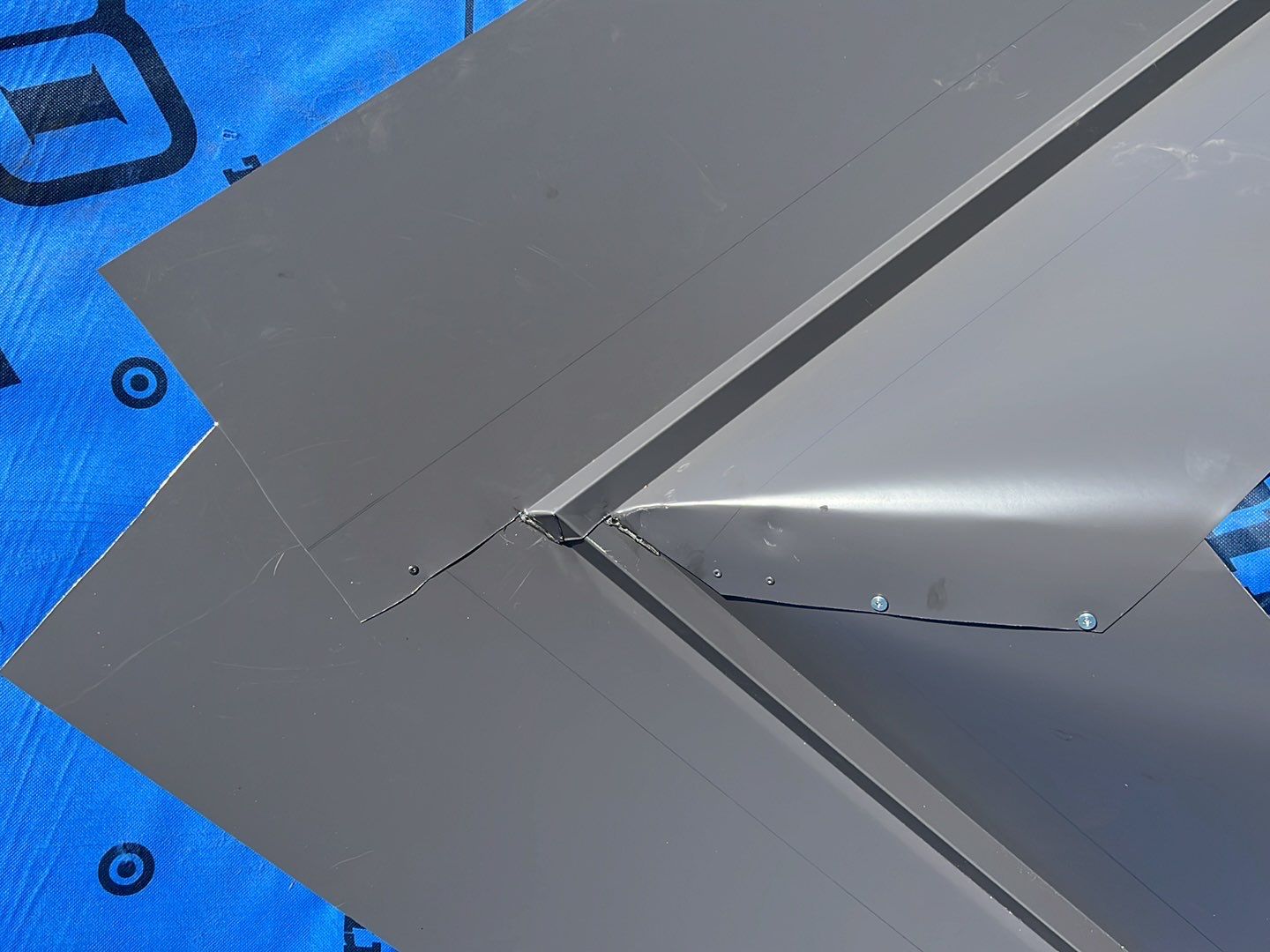 Agricultural Roofing Installation using 12" Prolok metal  by Top Notch Roofing Inc