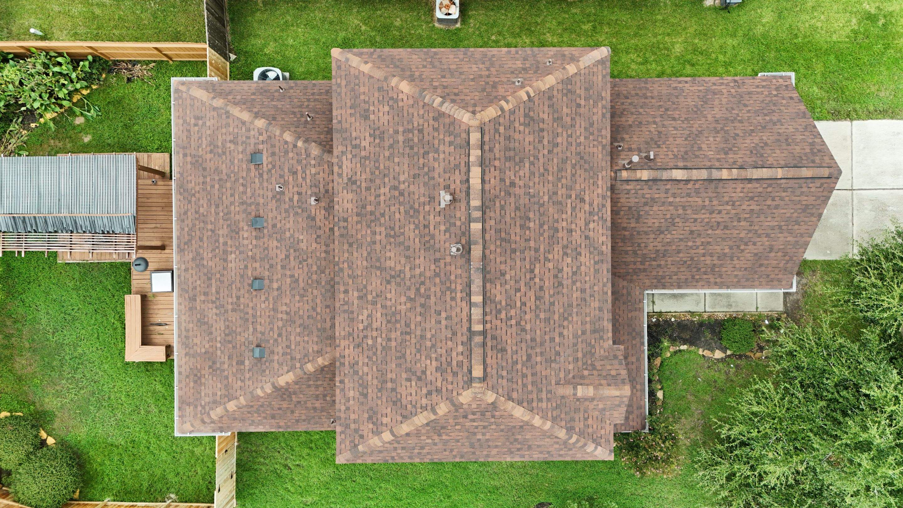 Full Roof Replacement in Warm Brown Tones — Spring, TX by PL Roofing & SB Roofing, LLC.