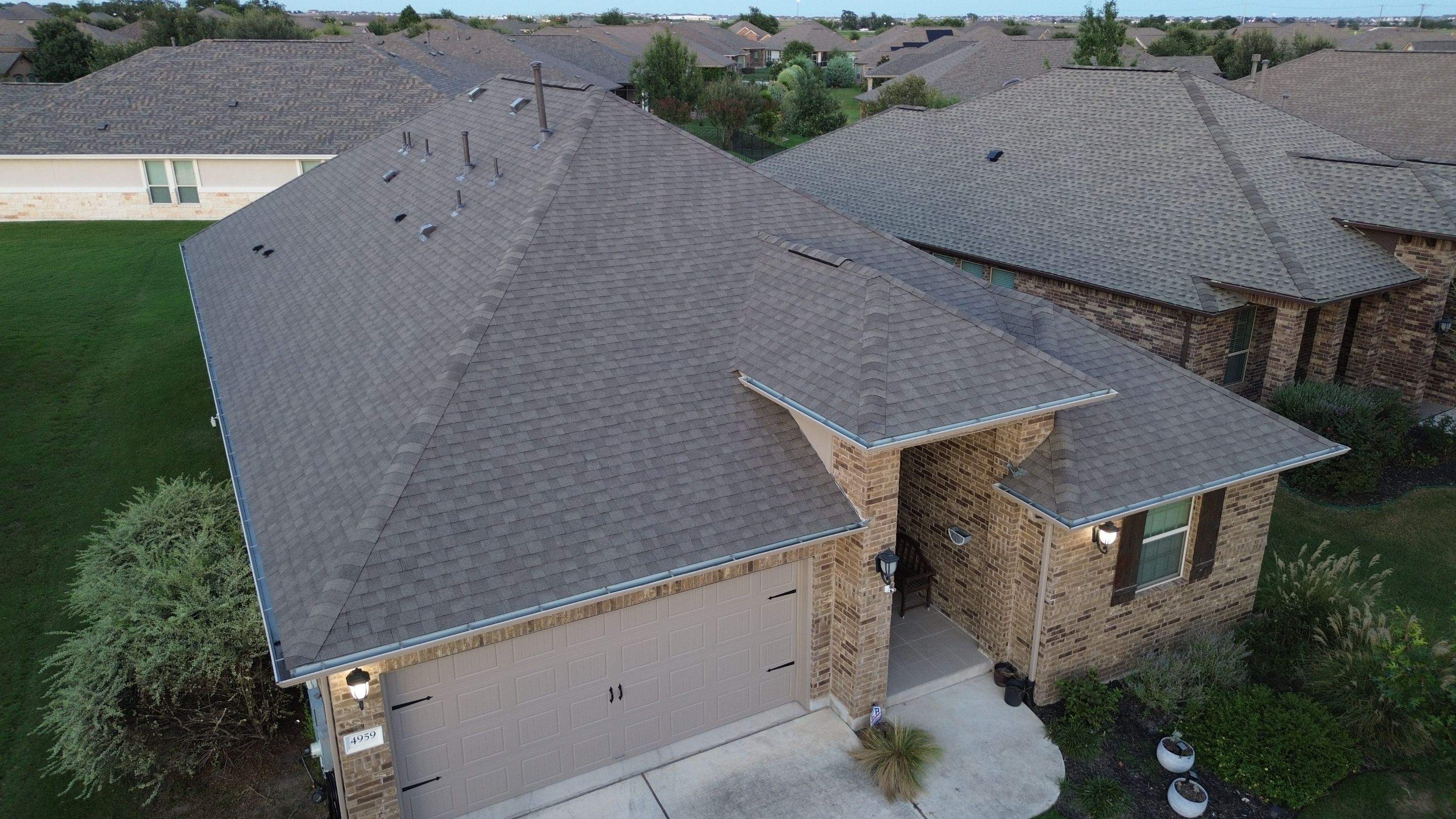 IKO Cambridge Weathered Wood by DeZign Roofing & Exteriors