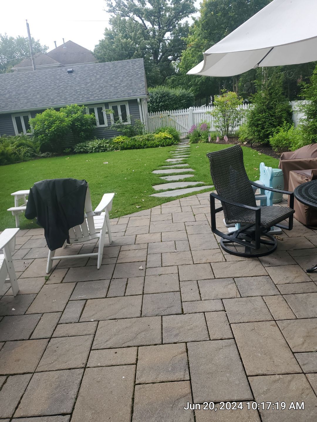 concrete cleaning using Algaecide, soft wash soap by Northern Power Washing LLC.