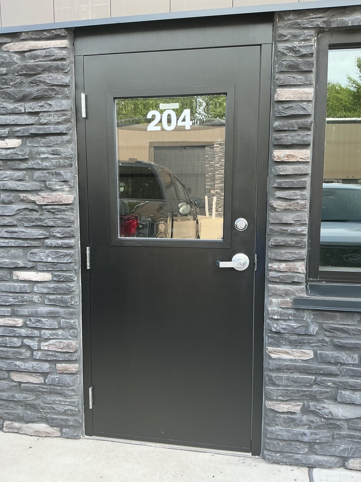 Commercial Exterior Door Repaint by Midwest Paint LLC