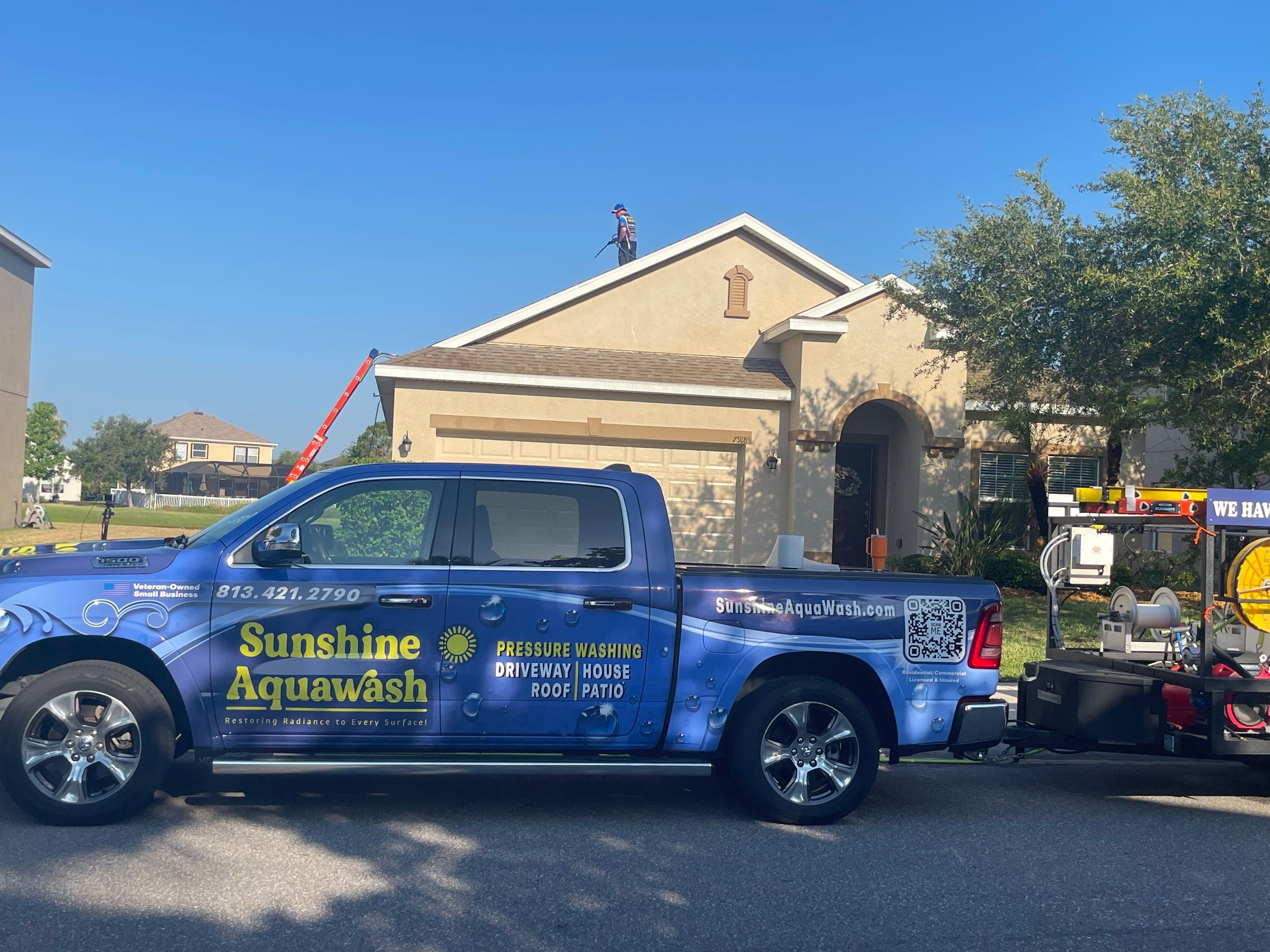 Asphalt Shingle Roof Soft Wash Cleaning & Concrete Pressure Washing in CopperStone Community, Parrish, FL by Sunshine AquaWash