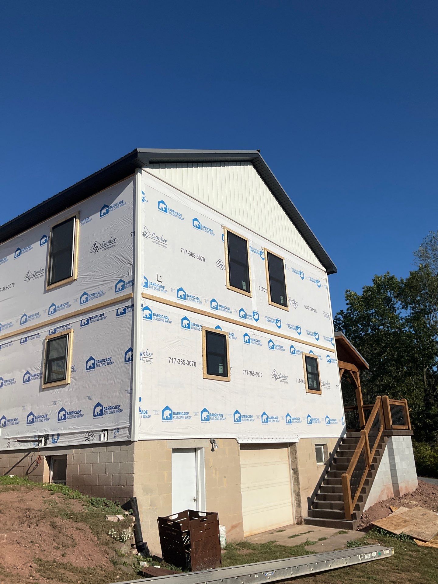 Two-Story Residential Addition and Exterior Transformation by Esh Builders