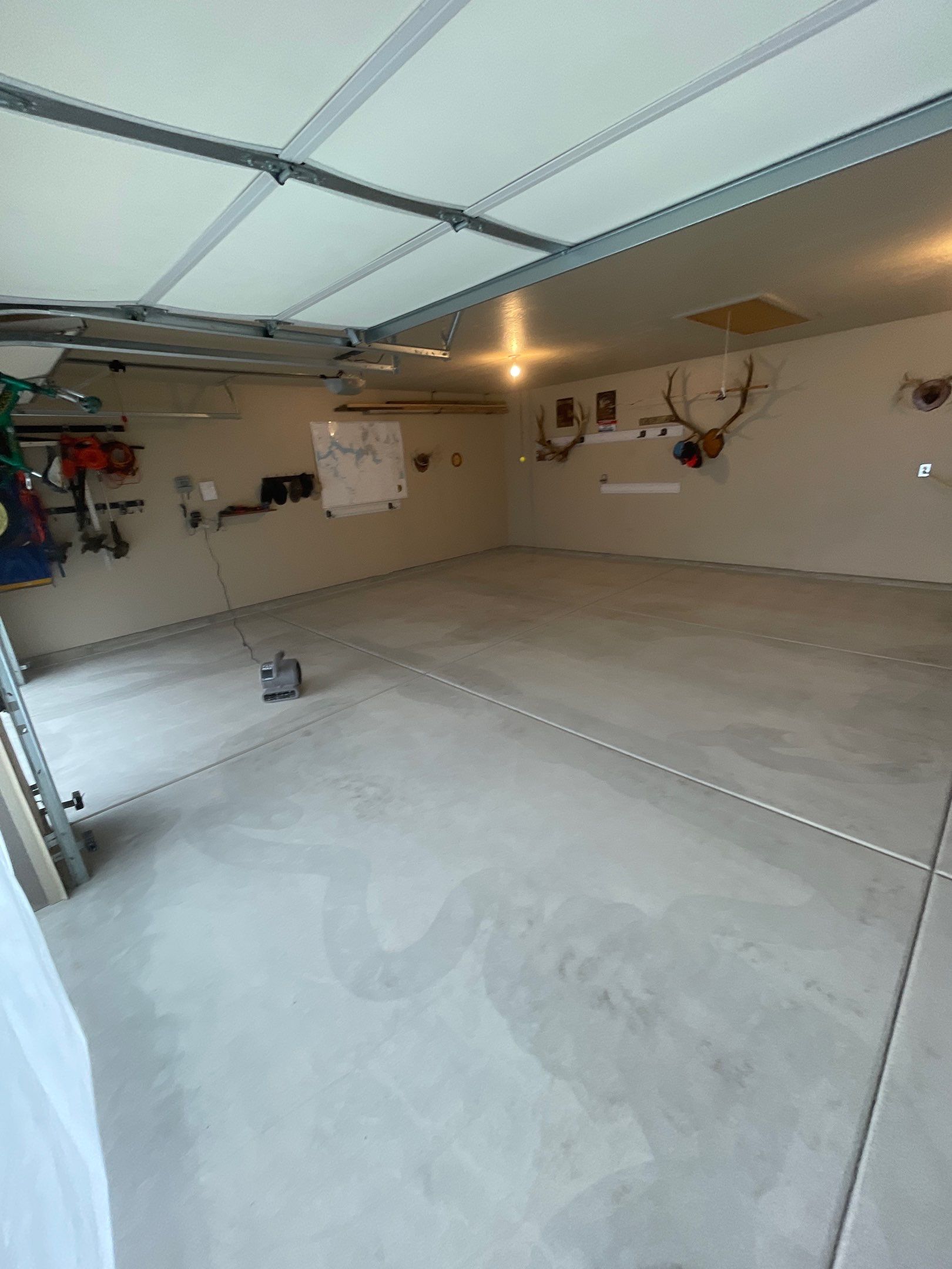 Garage Transformation using Pebble Beach and Front Porch using Greystone by Croc Coatings, LLC