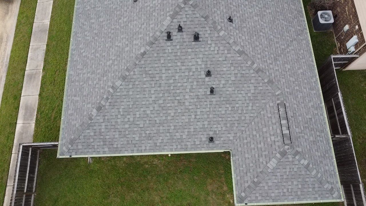 Reroof and Gutter Project in Houston by Roofing Technologies Unlimited