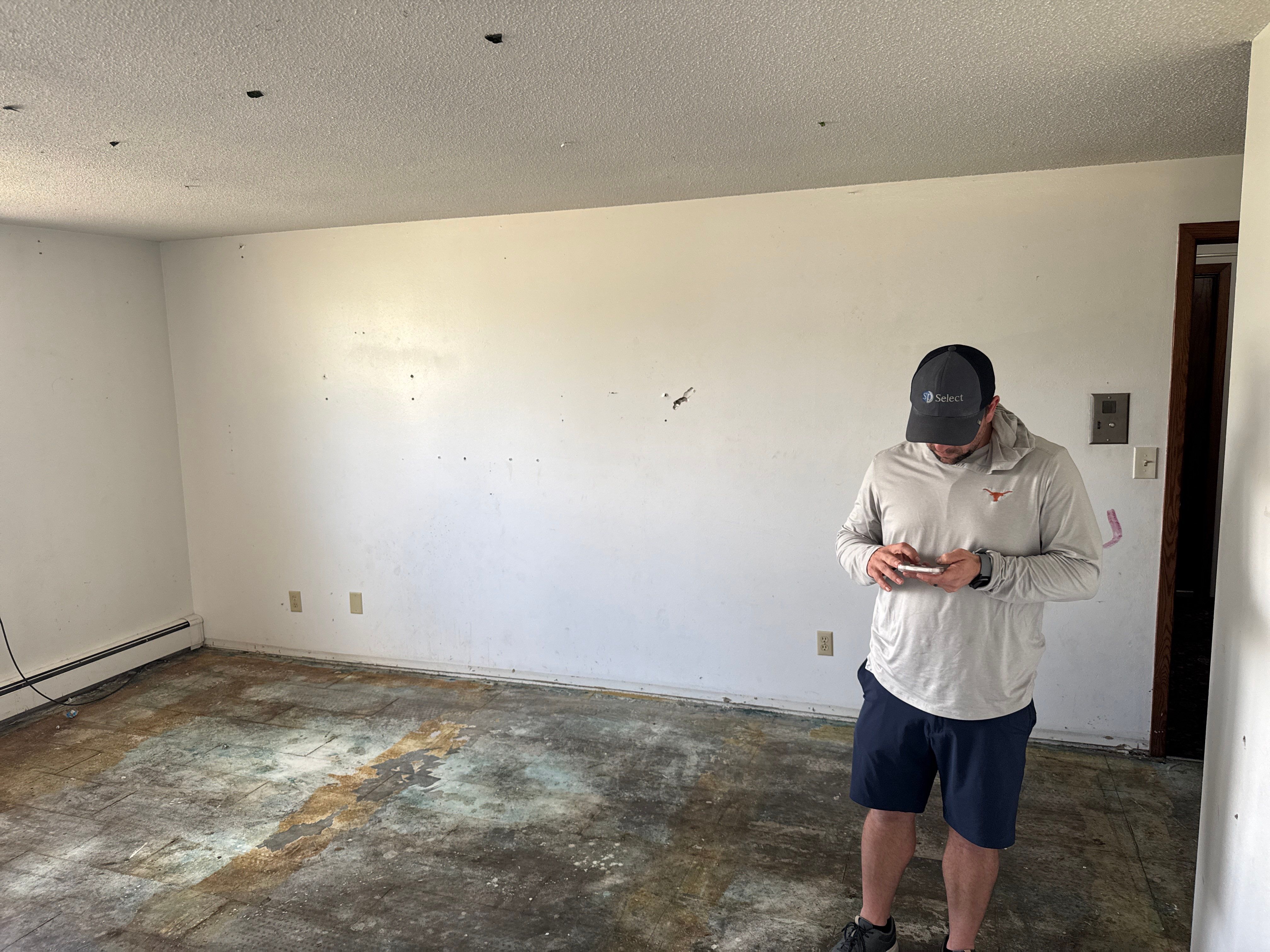 Commercial Subfloor Preparation and Flooring Restoration in Sioux Falls by Select Painting, Coatings & Garage Cabinets